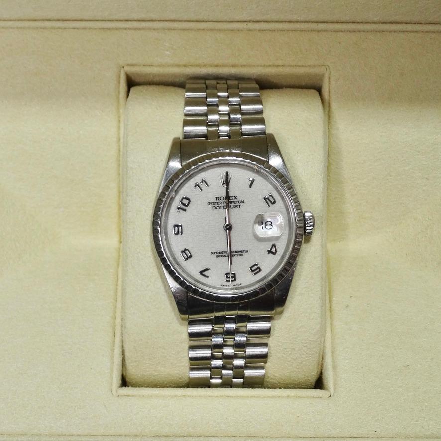 Do not miss out on this incredible 1991 classic Rolex Oyster Perpetual Datejust watch! A 36 mm white gold face is joined together by a sterling silver bezel to create this timeless collectors piece of jewelry.  This is such a versatile and