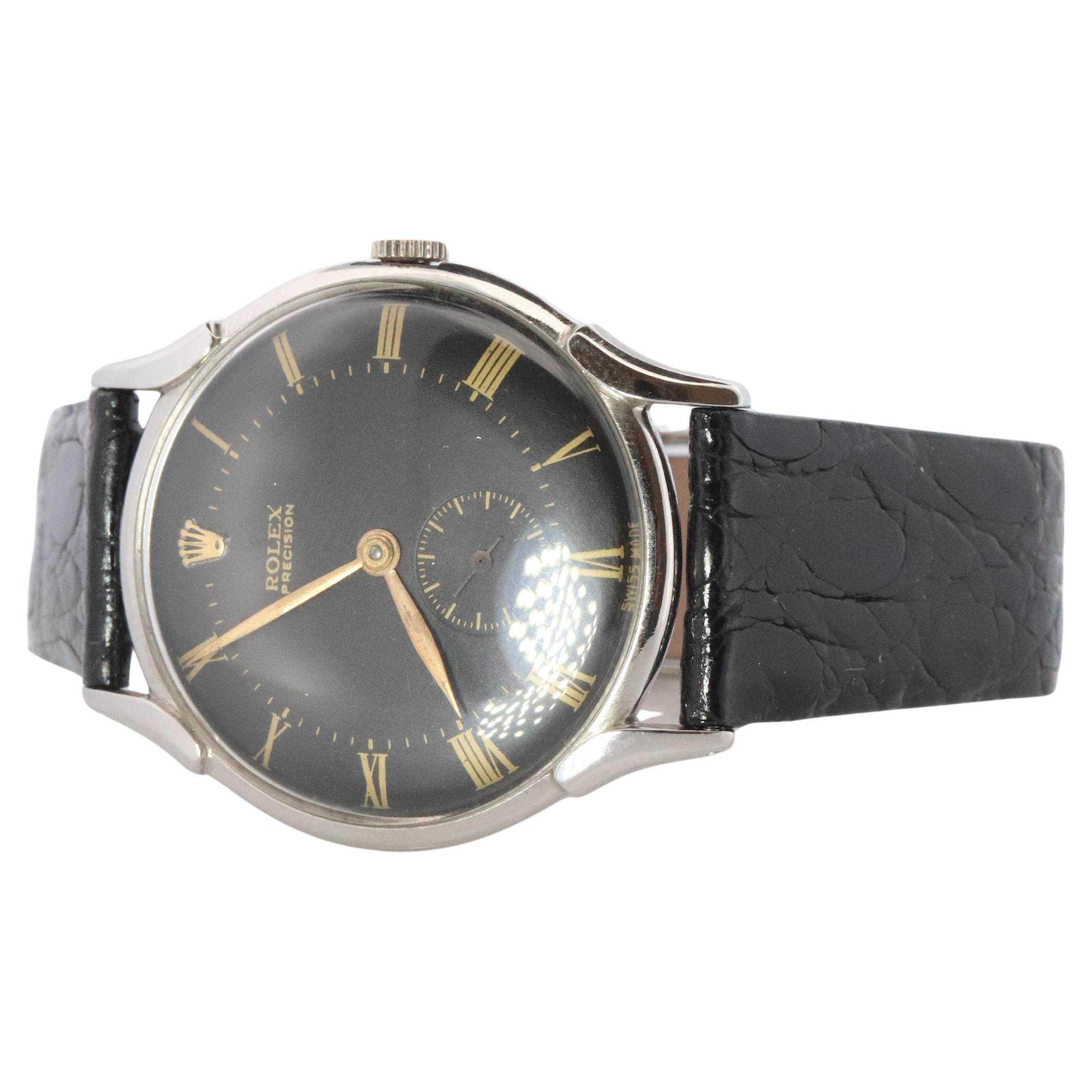 Reloj ROLEX. Rolex ref. 4498 Precision 1940s Reloj Rolex de caballero con esfera negra.