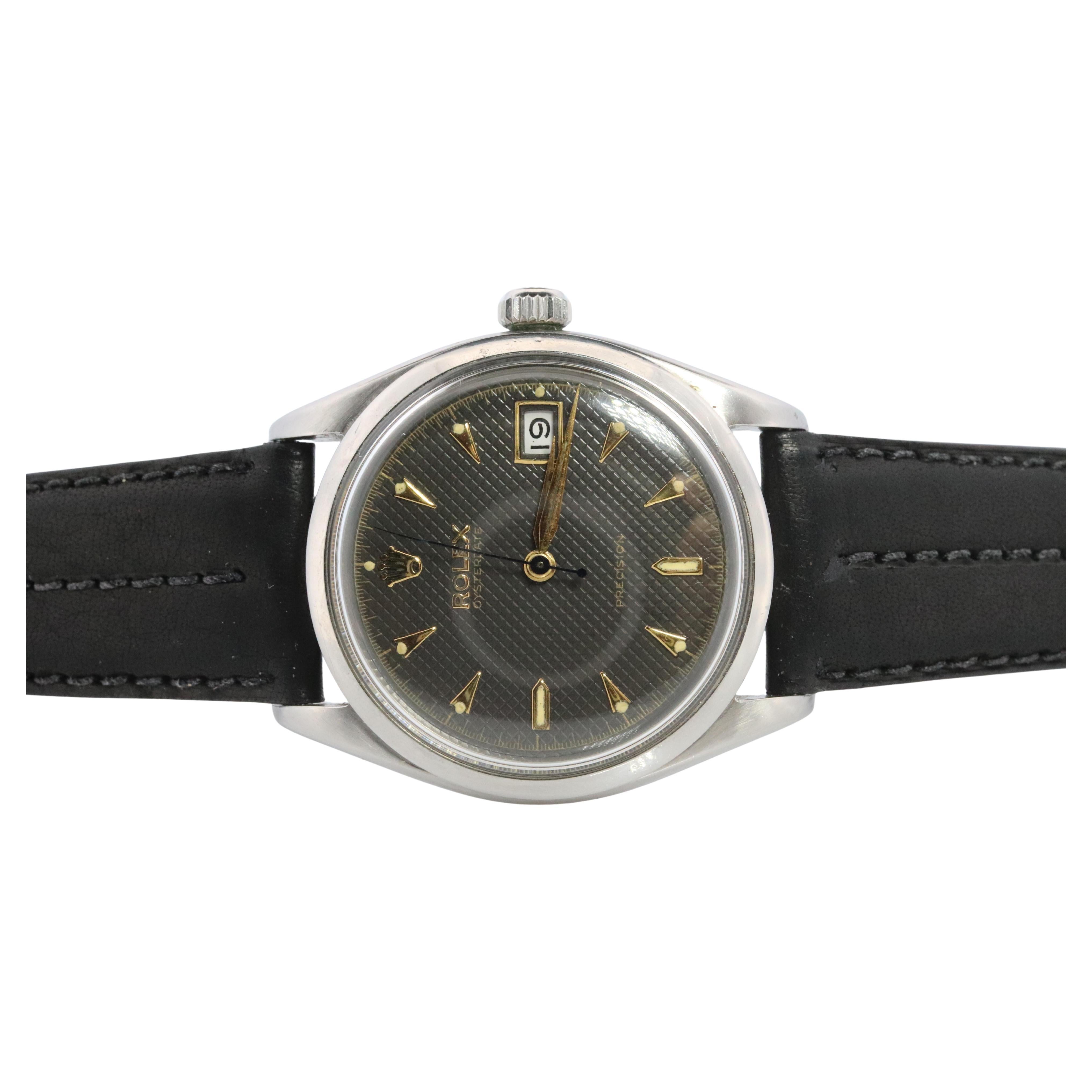 ROLEX Watch. Rolex ref. 6294 Rare Black Honeycomb Dial 1950s Mens Rolex watch.