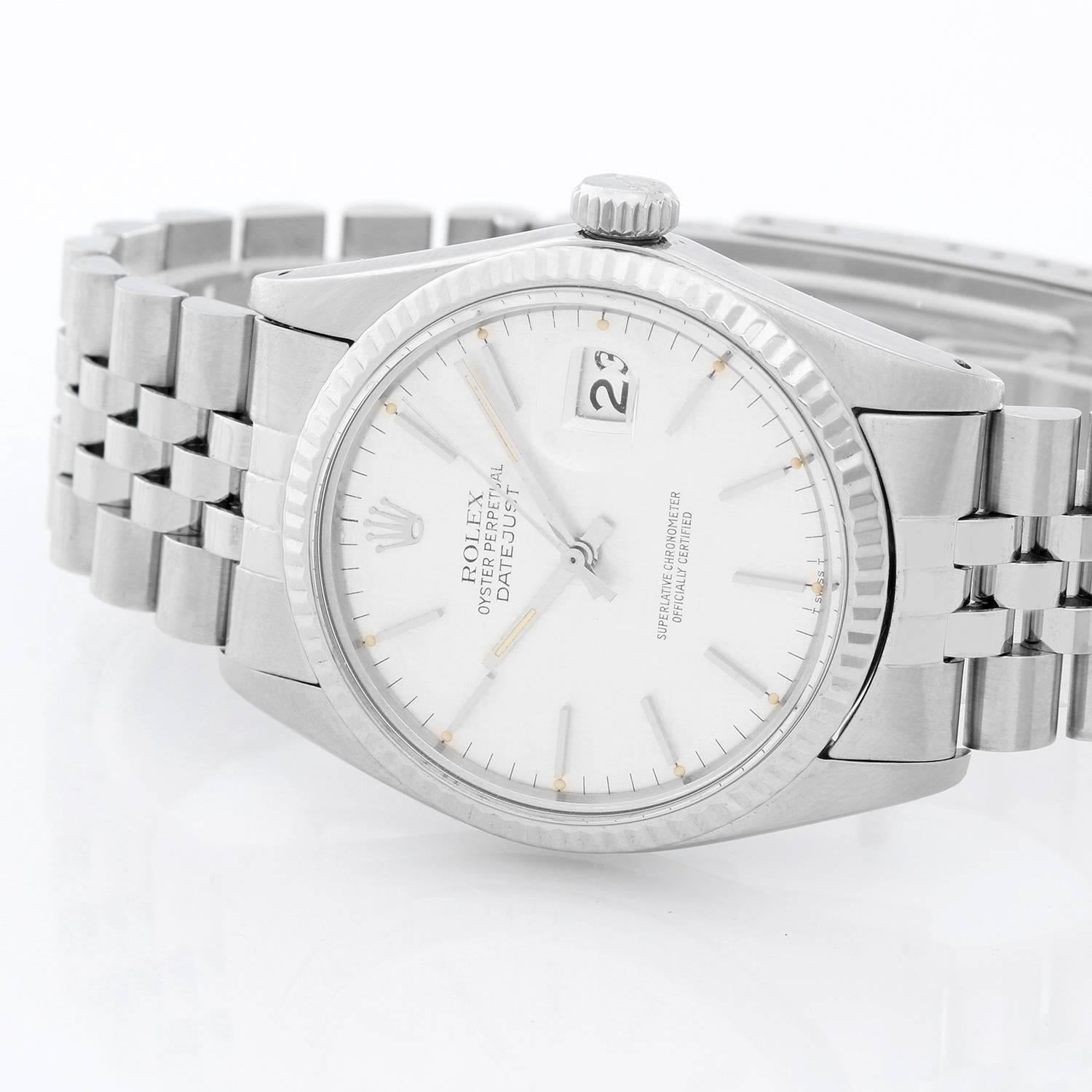 Rolex Datejust Men's Stainless Steel Watch Silvered Dial 16014 - Automatic winding, 27 jewels, Quickset, acrylic crystal. Stainless steel case with white gold Fluted bezel (36mm diameter). Textured Silvered dial . Stainless steel Jubilee bracelet.