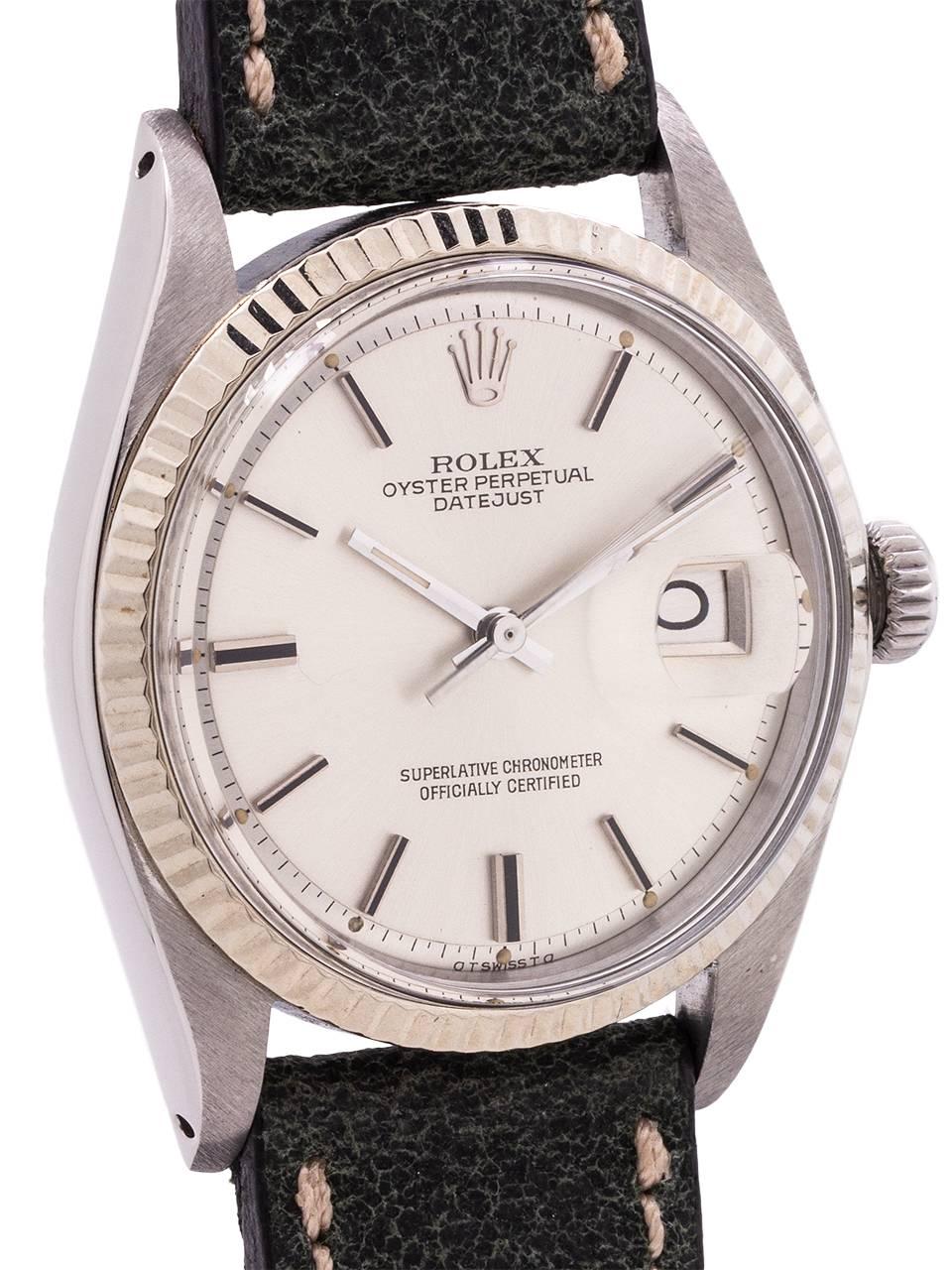 
Beautiful condition example Rolex stainless steel Datejust ref# 1601 serial# 2.8 million circa 1967. Featuring a 36mm diameter Oyster case with 18K WG fluted bezel, acrylic crystal, and original silvered satin dial with patina’d luminous dots,