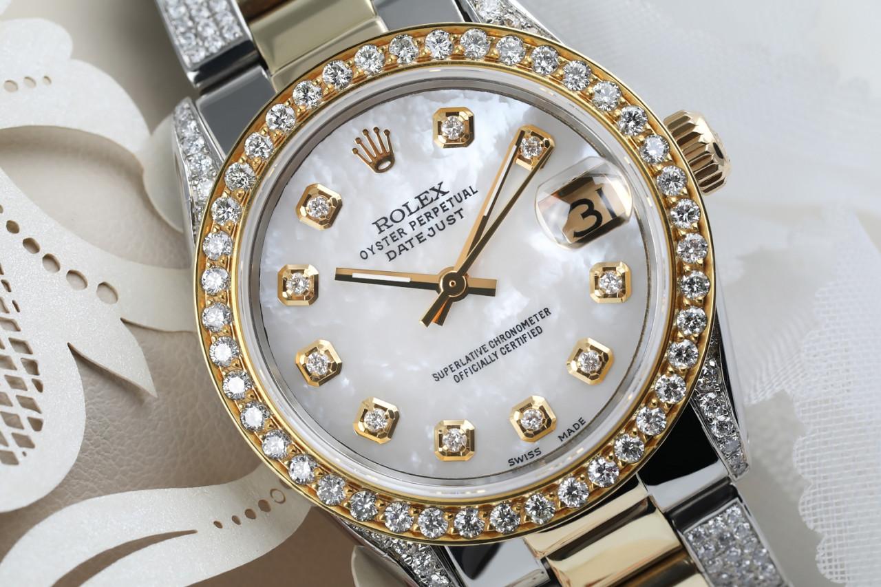 Rolex White Pearl 31mm Datejust 2Tone 18K Gold + SS + Side Diamonds Oyster Band + Bezel 68273
This watch is in like new condition. It has been polished, serviced and has no visible scratches or blemishes. All our watches come with a standard 1 year