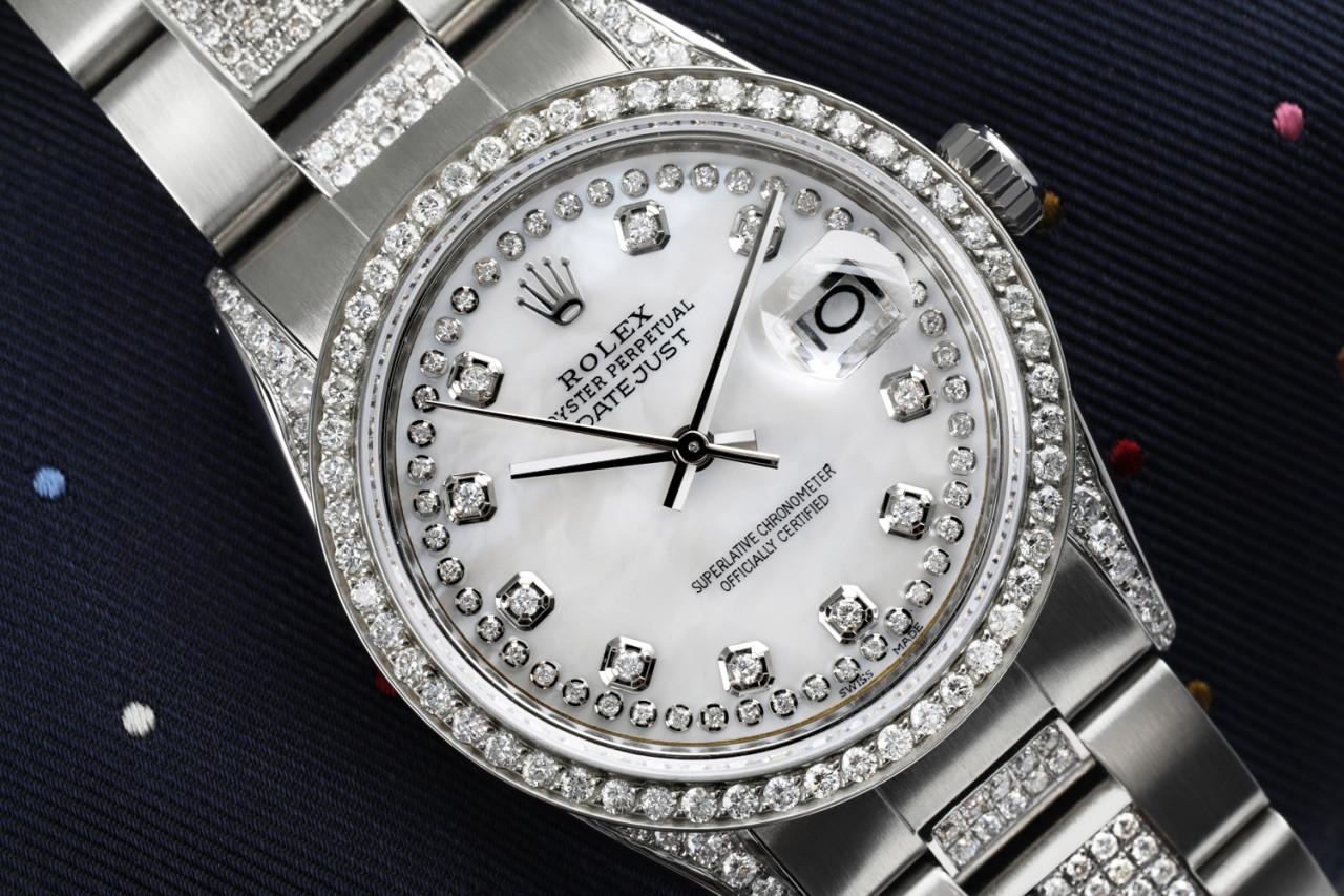 Rolex White Pearl String 36mm Datejust SS Diamond Bezel Lugs & Center Band 16014
This watch is in like new condition. It has been polished, serviced and has no visible scratches or blemishes. All our watches come with a standard 1 year mechanical