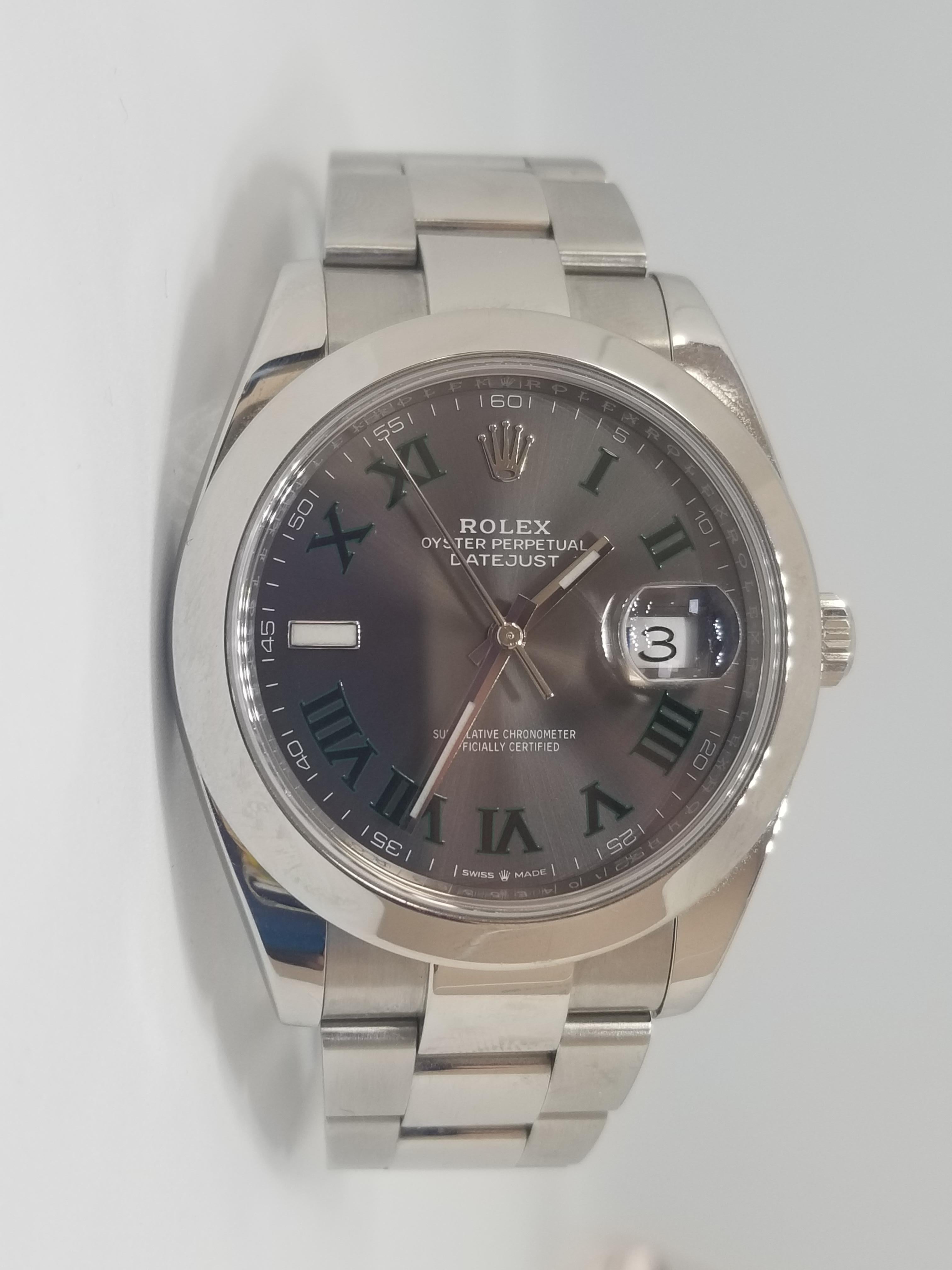 Watch comes with box and card. Also has original tags. Excellent condition. 2019 Wimbledon 41mm Model 126300

