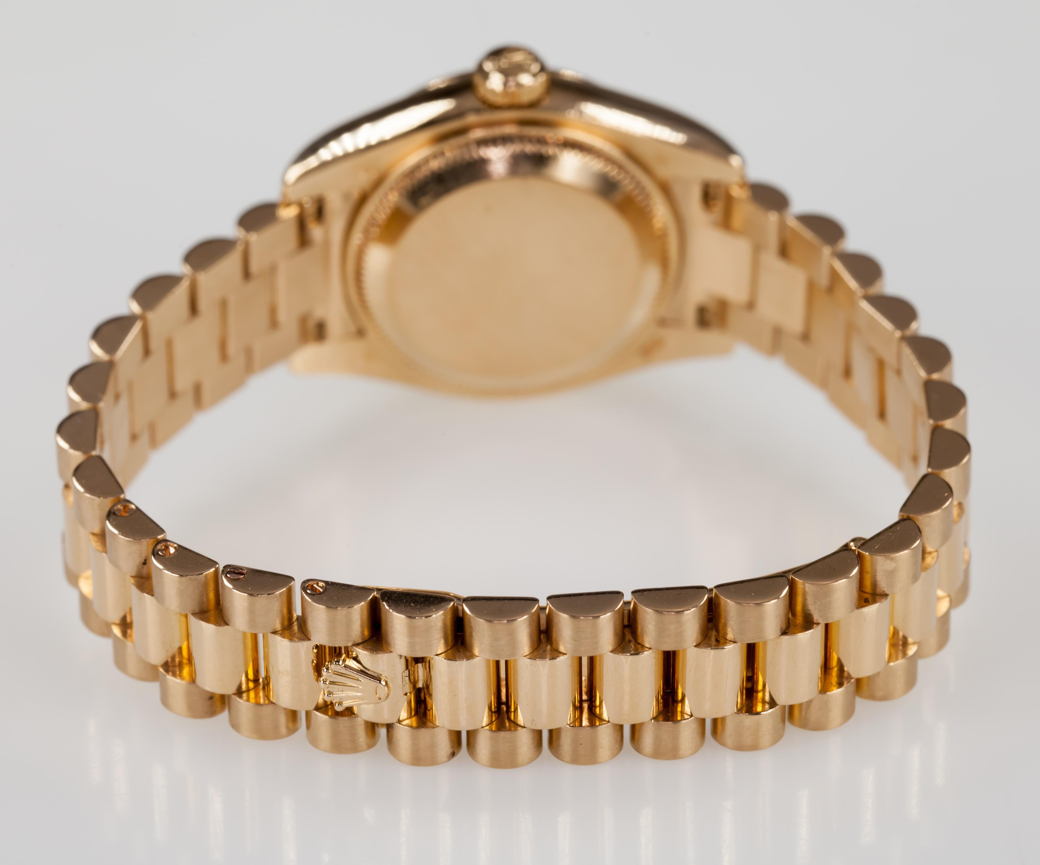 Modern Rolex Women's 18 Karat Yellow Gold President OPDJ Automatic Watch 179178