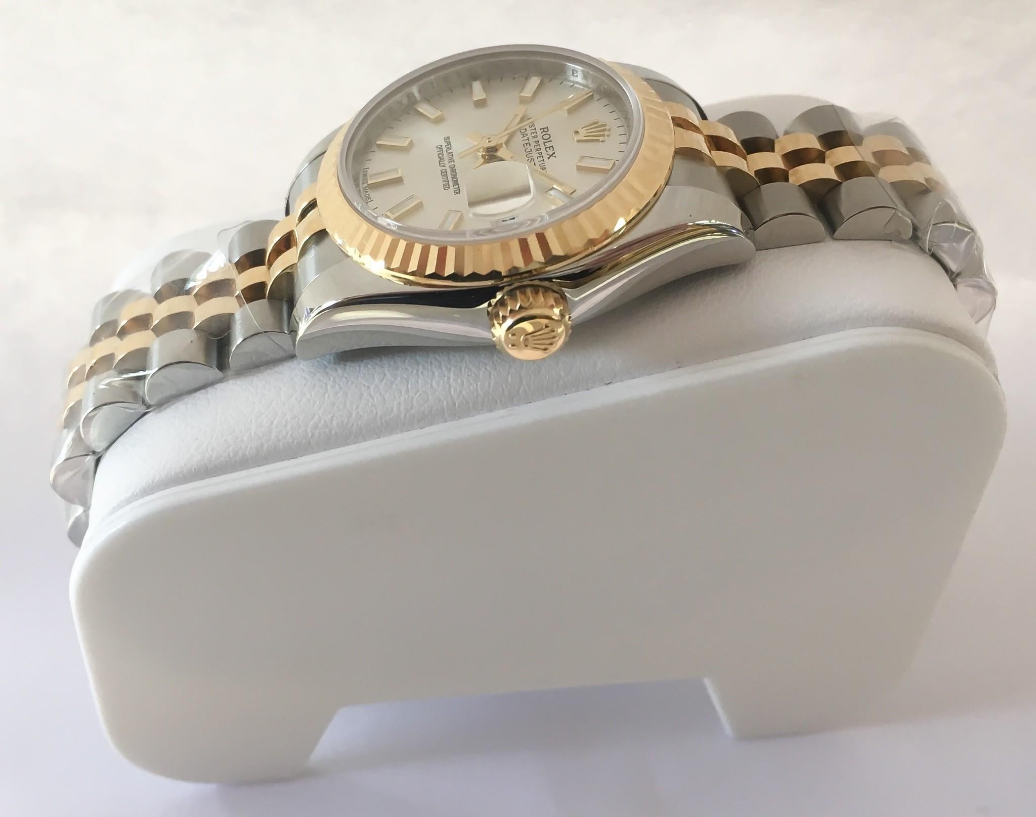 Beautiful new, unworn, 2013 women's Rolex Datejust designed in stainless steel & 18K yellow gold on a jubilee bracelet. Comes with all original box, papers, booklet.

•MODEL NO: 179173
•MOVEMENT: AUTOMATIC SELF WINDING 
•CASE MATERIAL: STAINLESS