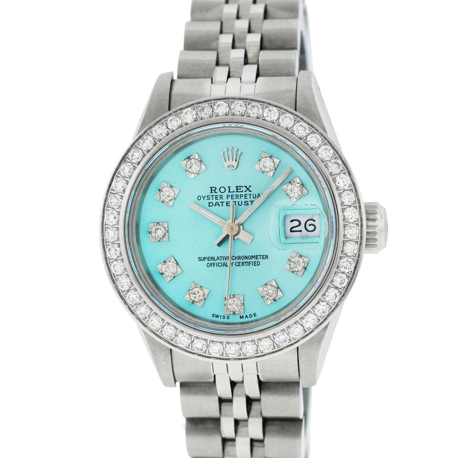 WATCH DESCRIPTION
 
BRAND : Rolex
MODEL : Datejust
CASE SIZE : 26mm
CASE : Rolex Stainless Steel Case
GENDER : Women's

WATCH FEATURES
 
DIAL : Rolex Professionally Refinished Ice Blue Dial set with aftermarket Genuine Round (VVS H Color) Diamond