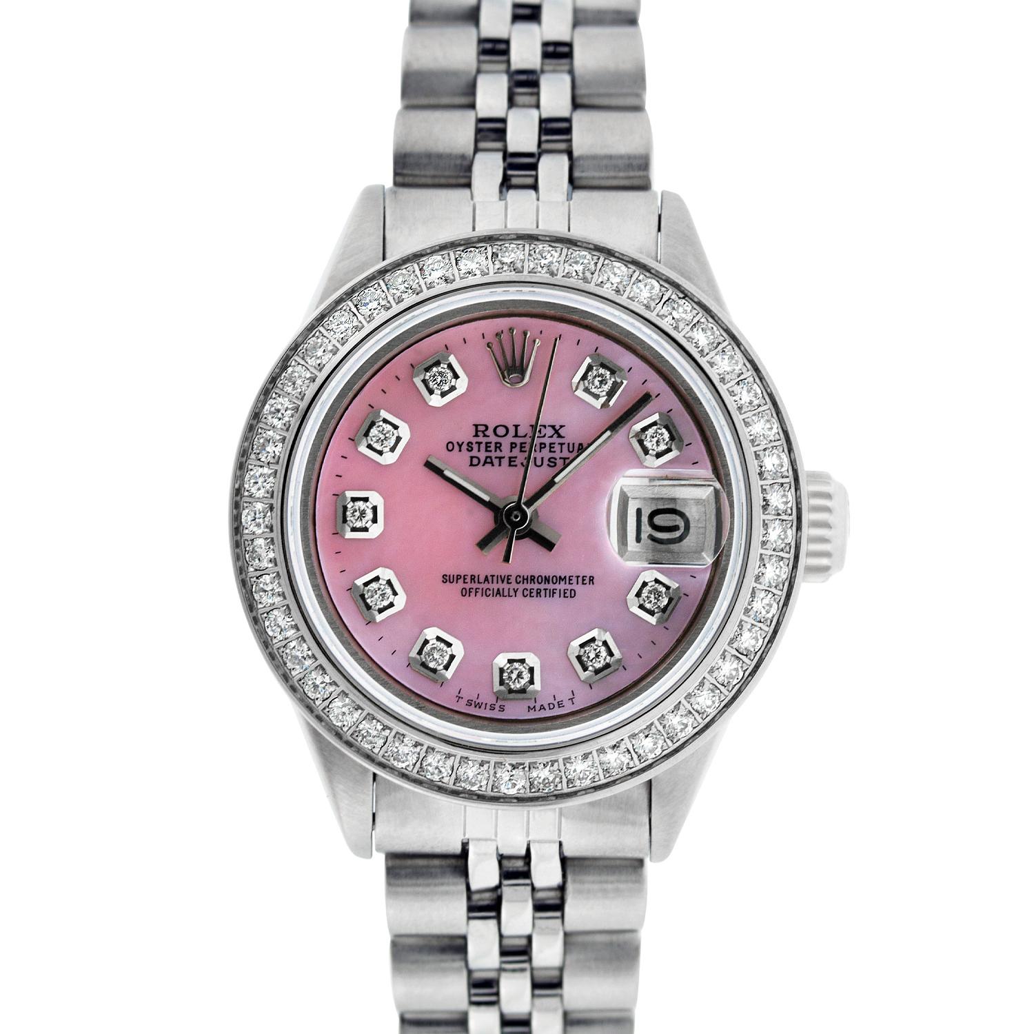 WATCH DESCRIPTION

BRAND : Rolex
MODEL : Datejust
CASE SIZE : 26mm
CASE : Rolex Stainless Steel Case
GENDER : Women's

WATCH FEATURES
 
DIAL : Rolex Professionally Refinished Pink Mother of Pearl Dial set with aftermarket Genuine Round (VVS H Color)