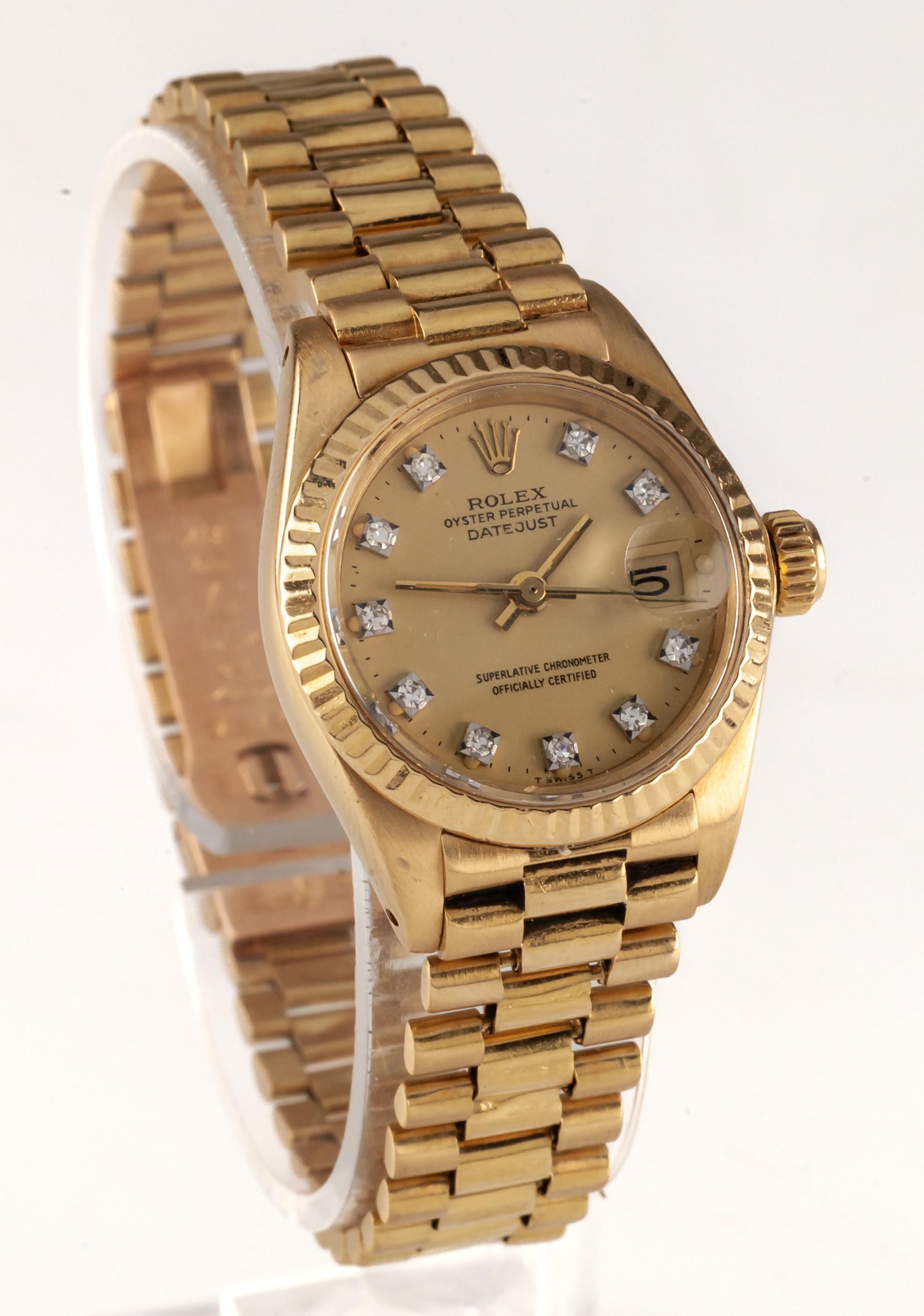 Rolex Women's President 18k Yellow Gold OPDJ 6917 Diamond Dial 1981

Case #6917
Serial #70141XX
Movement #2030 (28 Jewels)
Movement Serial #960890
Year: 1981

18k Yellow Gold Case w/ Fluted Bezel
26 mm in Diameter
Lug-to-Lug Distance = 32