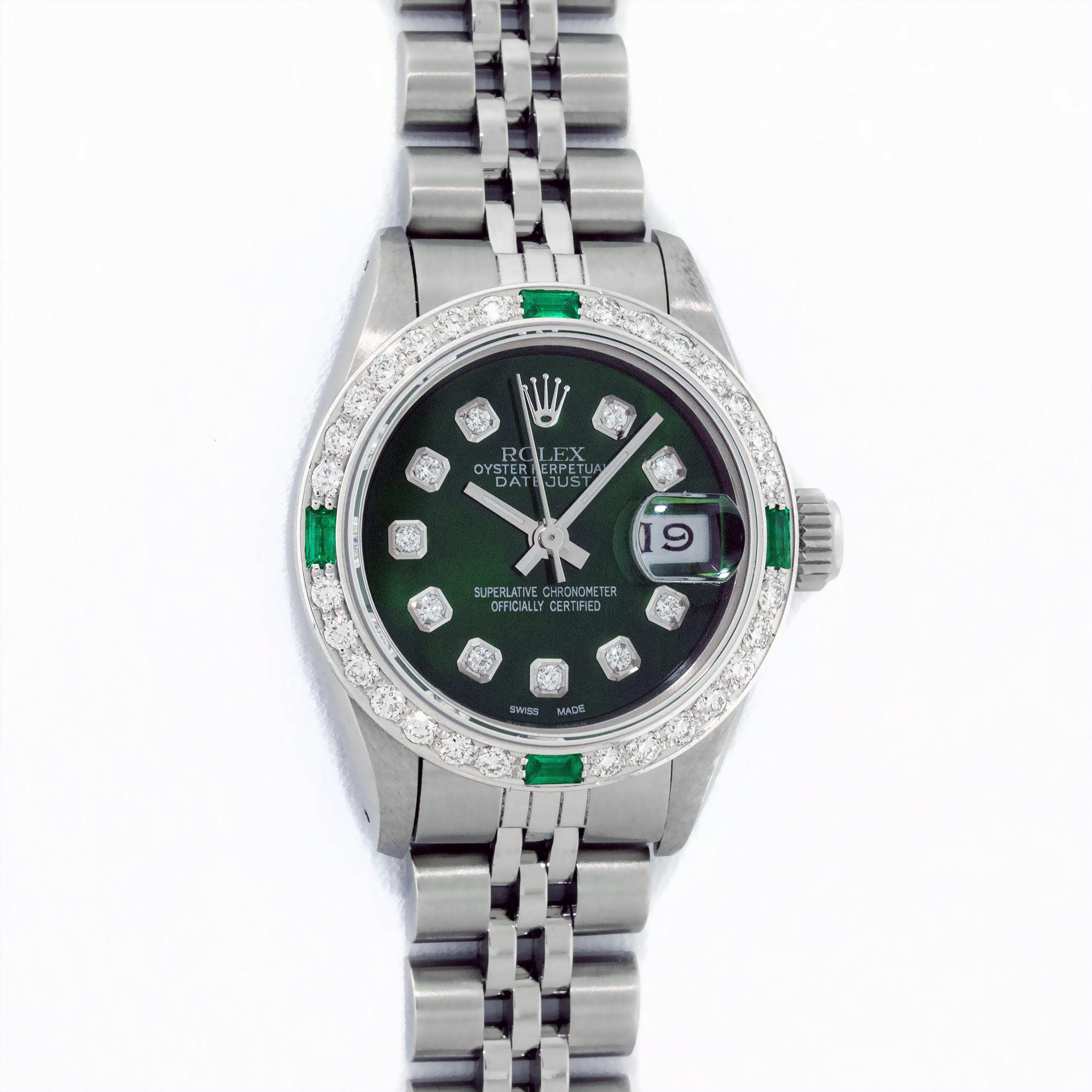 WATCH DESCRIPTION

BRAND : Rolex
MODEL : Datejust
CASE SIZE : 26mm
CASE : Rolex Stainless Steel Case
GENDER : Women's

WATCH FEATURES
 
DIAL : Rolex Custom Refinished Green With Genuine Round (VVS H Color) Diamond Hour Markers
BEZEL : Custom 18K