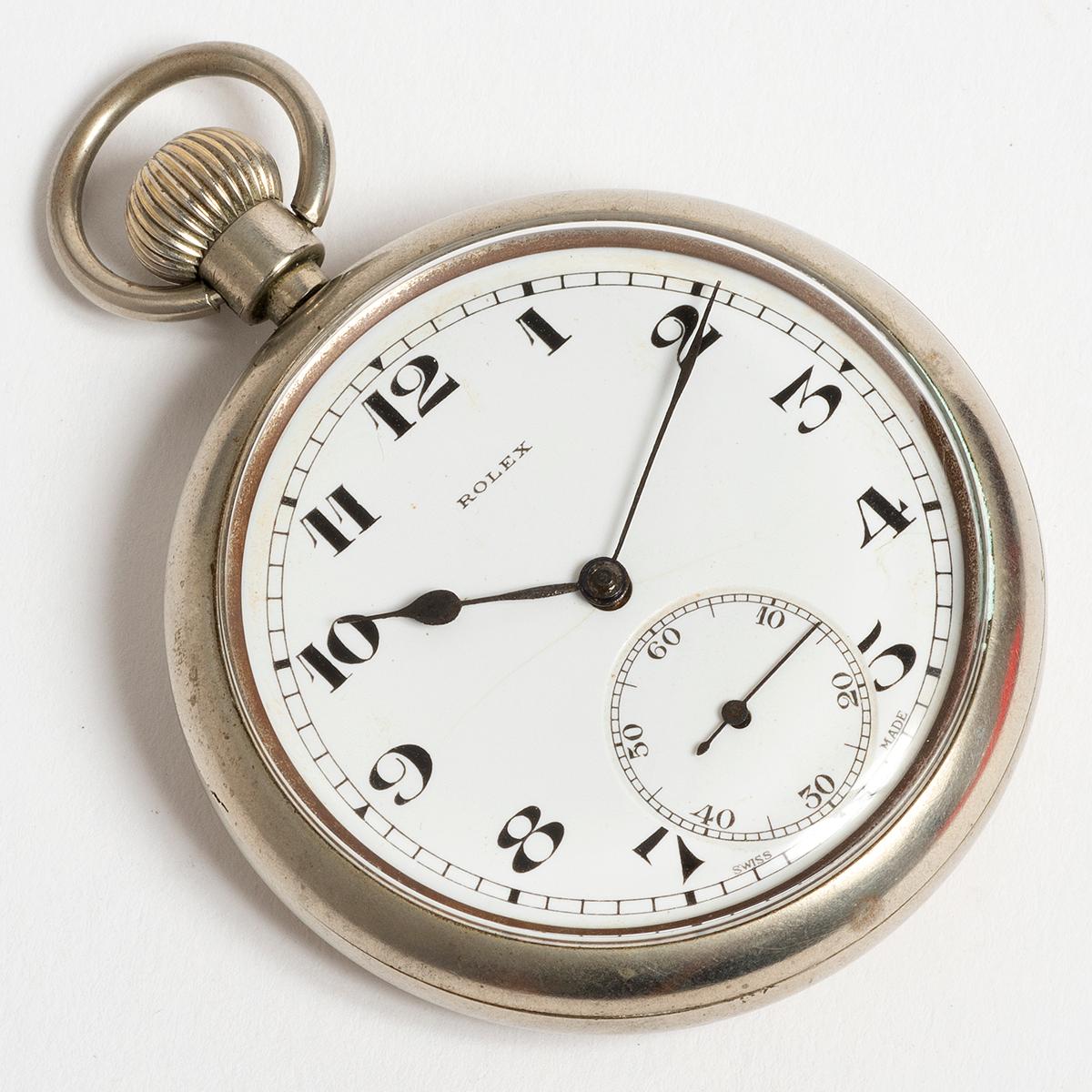 Our vintage and extremely rare pocket watch has a cal. 590 Rolex movement and case by Calcort. A late military request for these pocket watches, during WW2 led to a rush for precision Rolex movements, and steel casing to be ready for issue. This