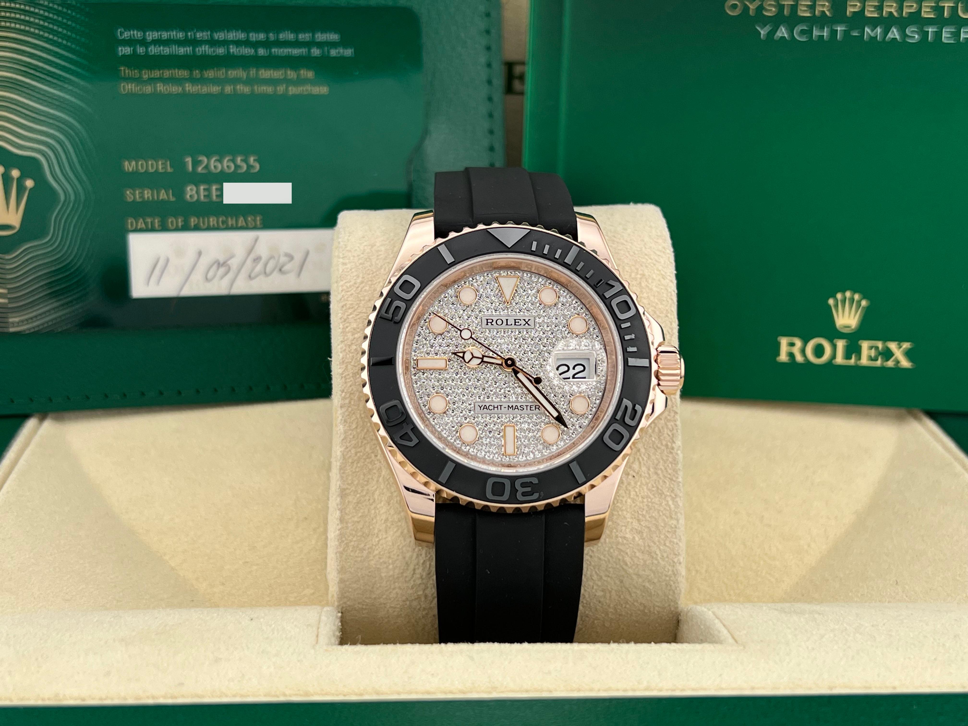 Style Number: 126655

Serial: 8EE32***

Year: 2021

Model: Rolex Yacht Master 

Case Material: 18K Rose Gold 

Band: Rolex Oysterflex Black Rubber Strap

Bezel: Black 

Dial: Factory Pave Diamond Dial 

Face: Sapphire Crystal 

Case Size: 40mm