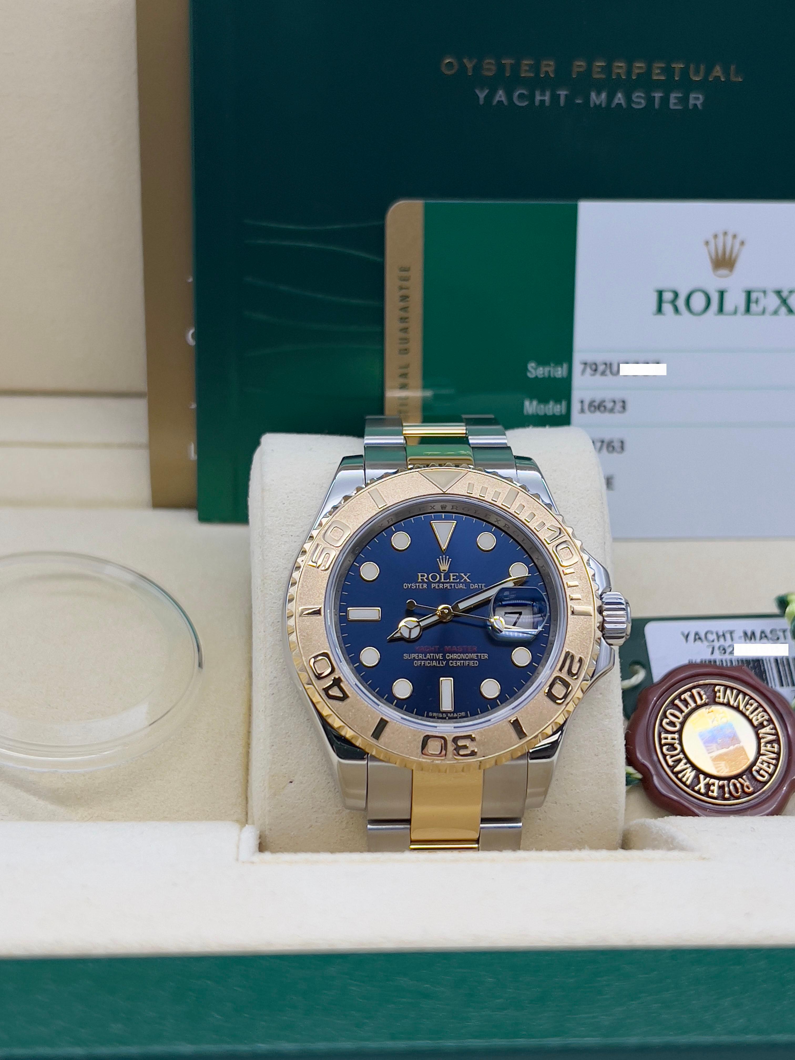 Style Number: 16623
Serial: 792U0***
Year: 2015
Model: Rolex Yacht Master 
Case Material: Stainless Steel
Band: 18K Yellow Gold & Stainless Steel
Bezel: 18K Yellow Gold
Dial: Blue 
Face: Sapphire Crystal
Case Size: 40mm
Includes: 
-Rolex Box &