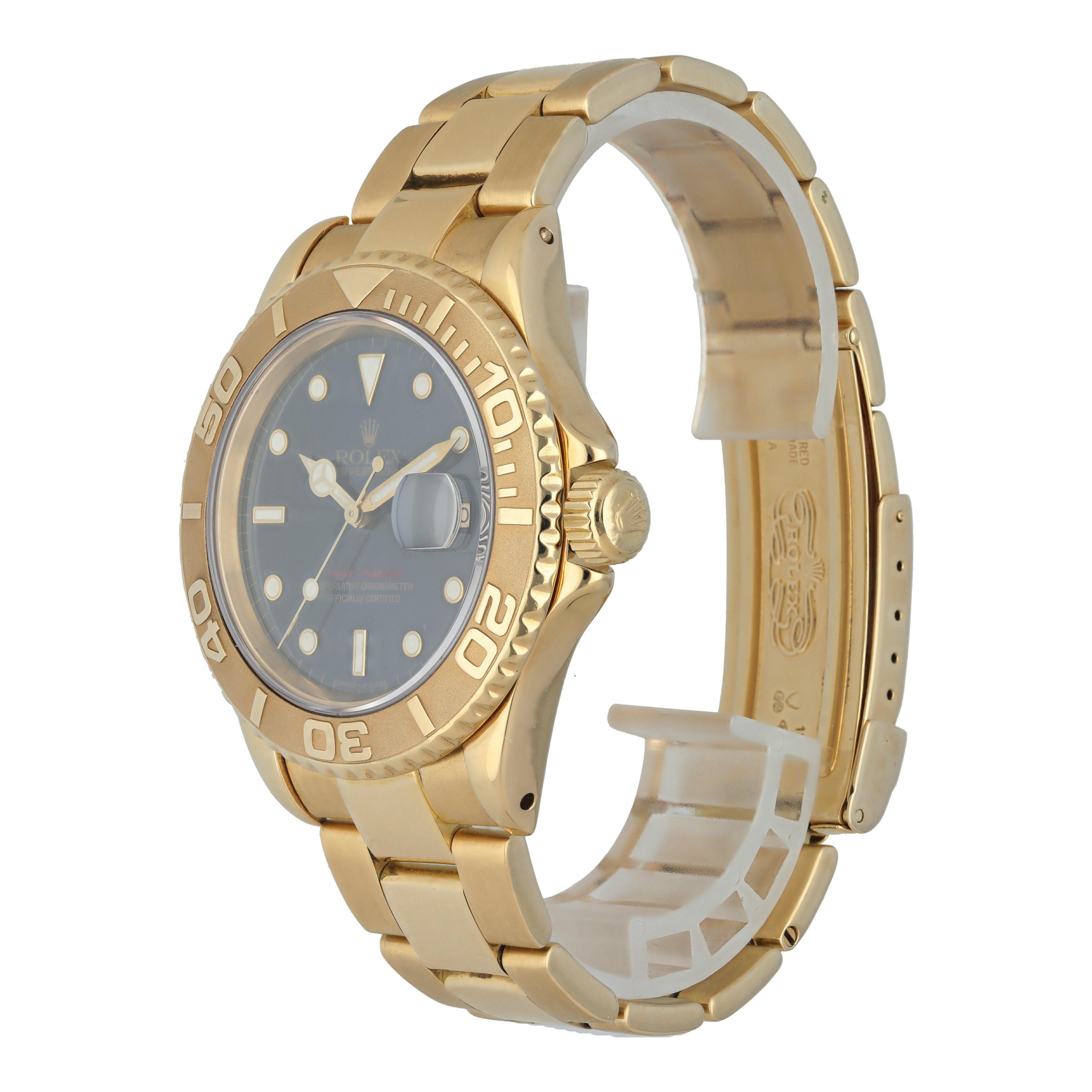 Rolex Yacht-Master 16628 Blue Dial Men's Watch.
Yellow gold 40mm case with unidirectional rotating bezel.
Blue dial with gold hands and dot hour markers.
Date display at the 3 o'clock position.
Minute markers around the outer dial.
Yellow gold