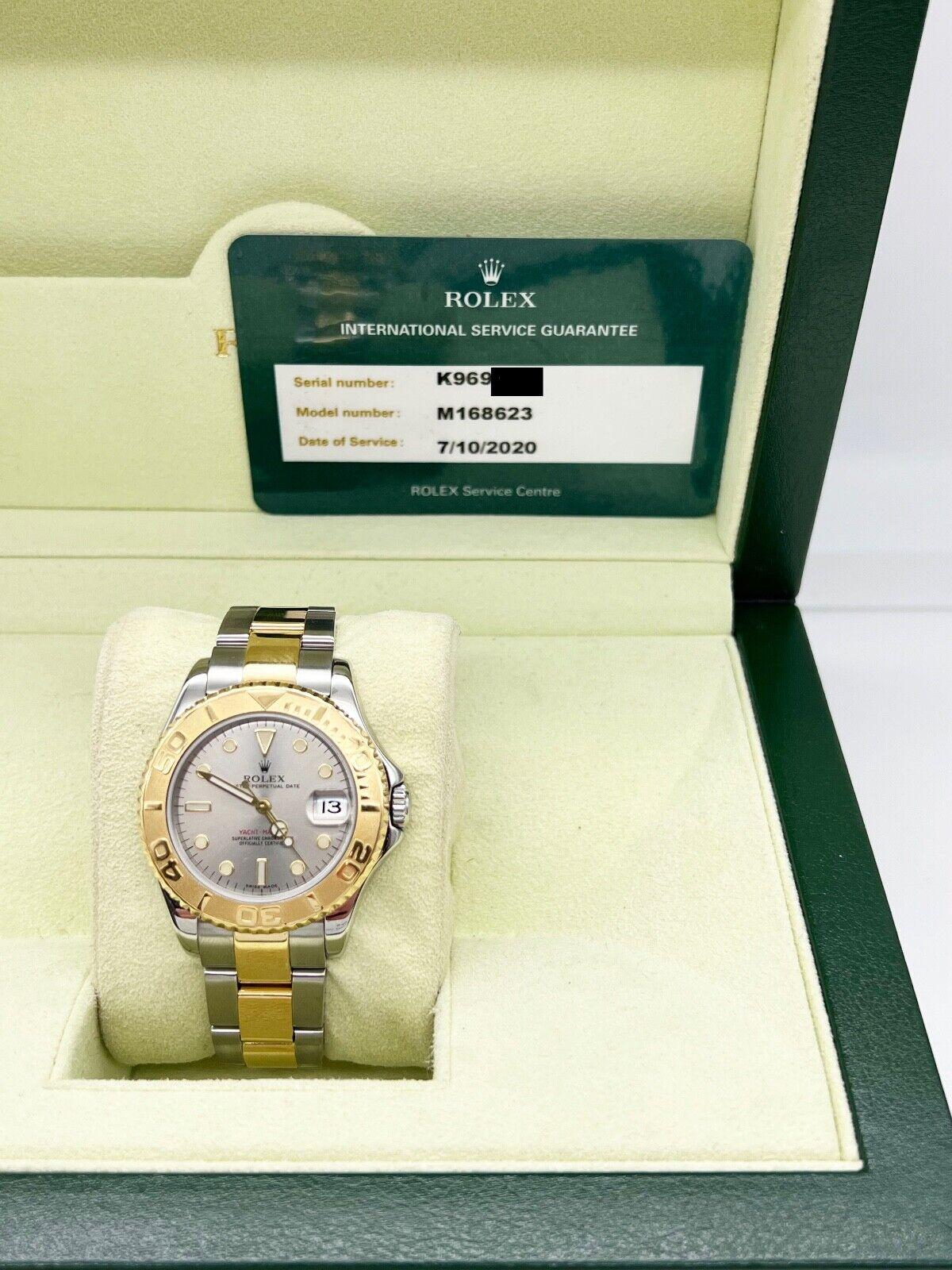 Rolex Yacht Master 168623 Silver Midsize 35mm 18K Gold Steel Box Service Paper In Excellent Condition For Sale In San Diego, CA