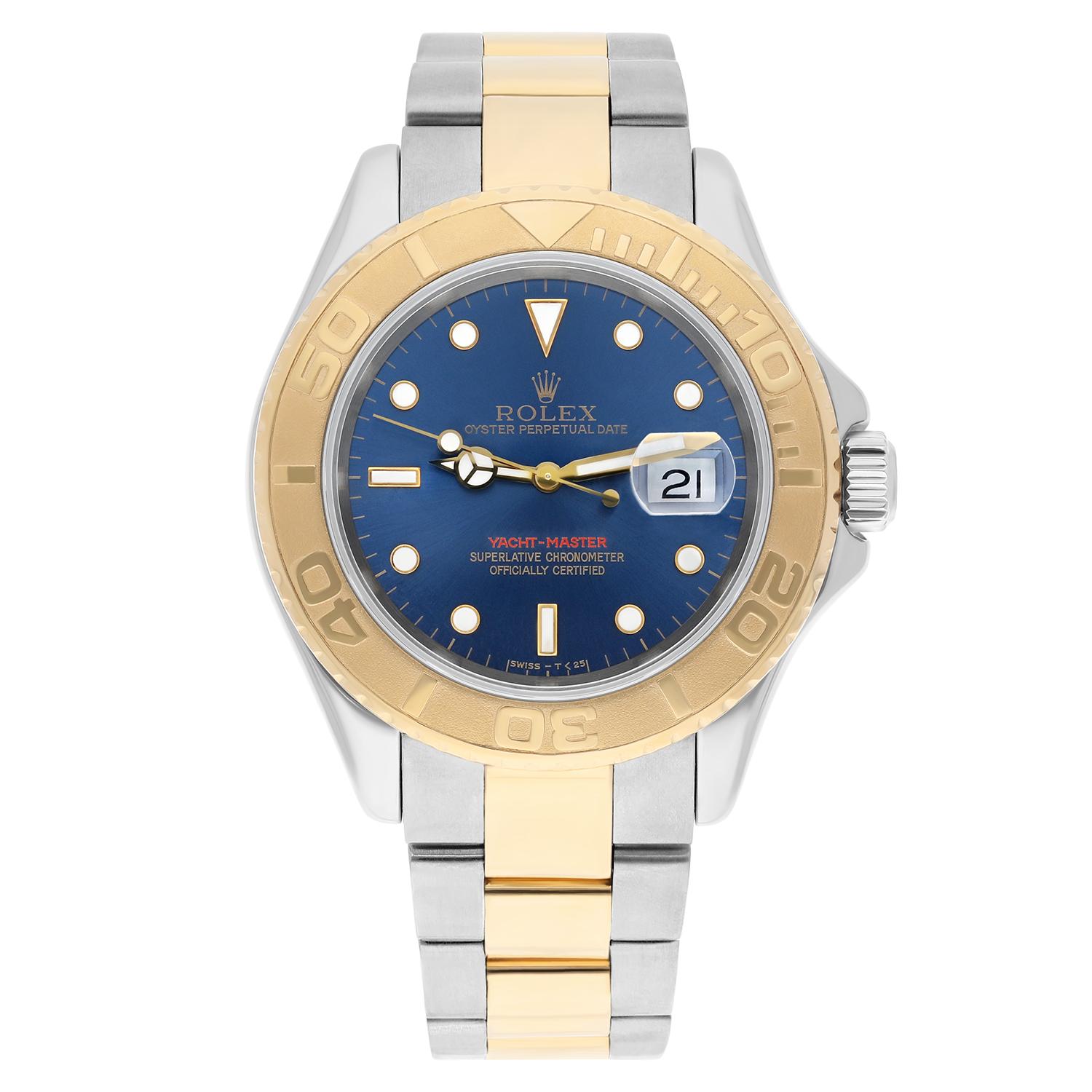 Excellent preowned mens Rolex Yacht-Master (ref. 16623; Z-series – 2006) in 18k yellow gold and stainless steel features blue dial with white hour markers. Comes on Rolex 2-tone Oyster bracelet with deployant buckle. Fits up to 7 inch wrist. Watch