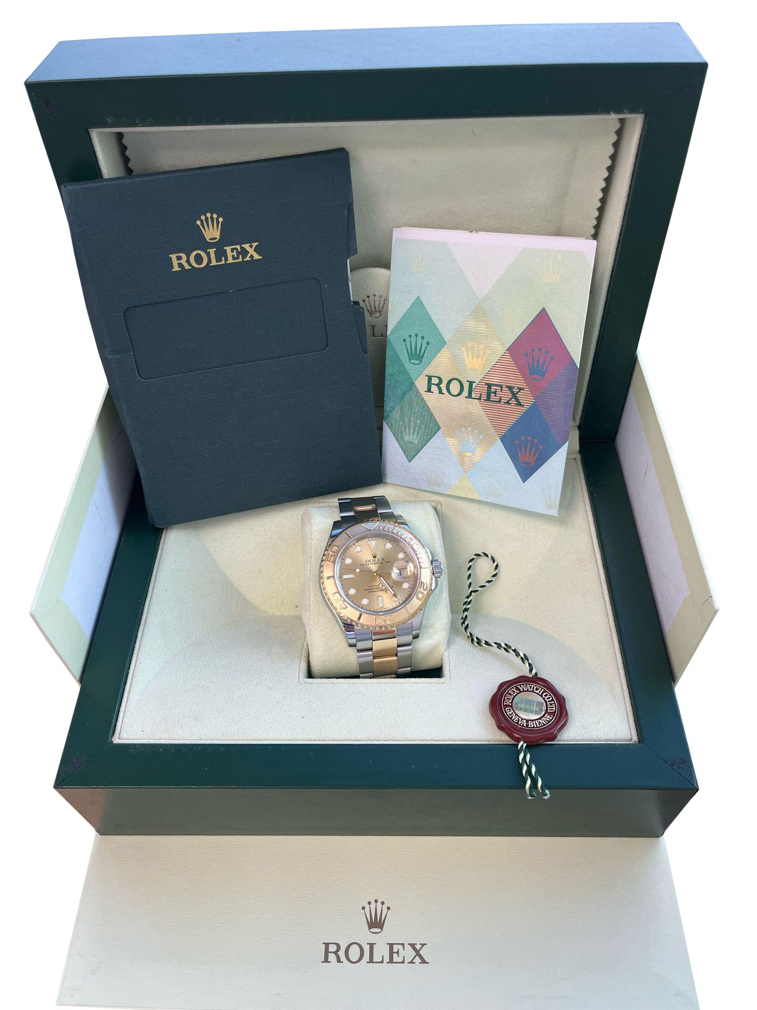 Rolex Yacht-Master Steel Yellow Gold Champagne Dial Mens Watch 16623. Officially certified chronometer self-winding automatic movement. Stainless steel case 40 mm in diameter. Rolex logo on a crown. 18k yellow gold special time-lapse bidirectional