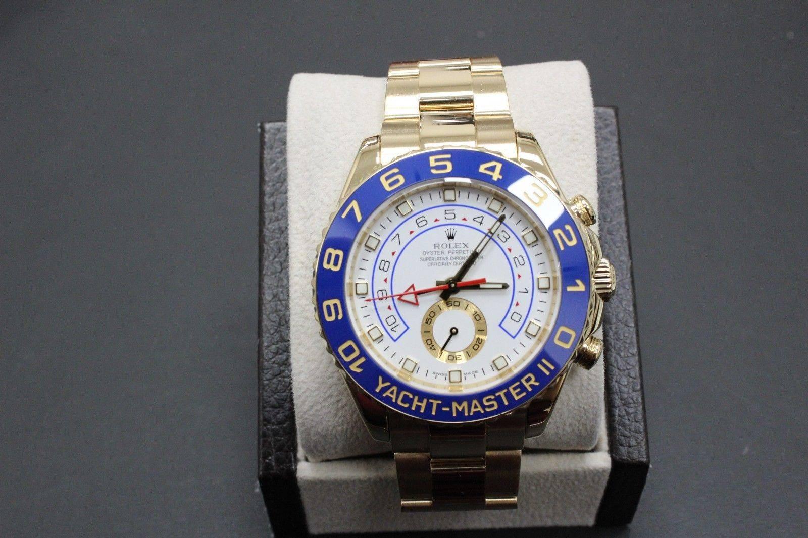 Style Number: 116688

Serial: M132***

Year: 2013

Model: Yacht Master II

Case: 18K Yellow Gold

Band: 18K Yellow Gold

Bezel: Blue Ceramic Ring 

Face: Sapphire Crystal

Dial: White Index

Case Size: 44mm 

Retail: $43,550

Includes: 
-Rolex Box &