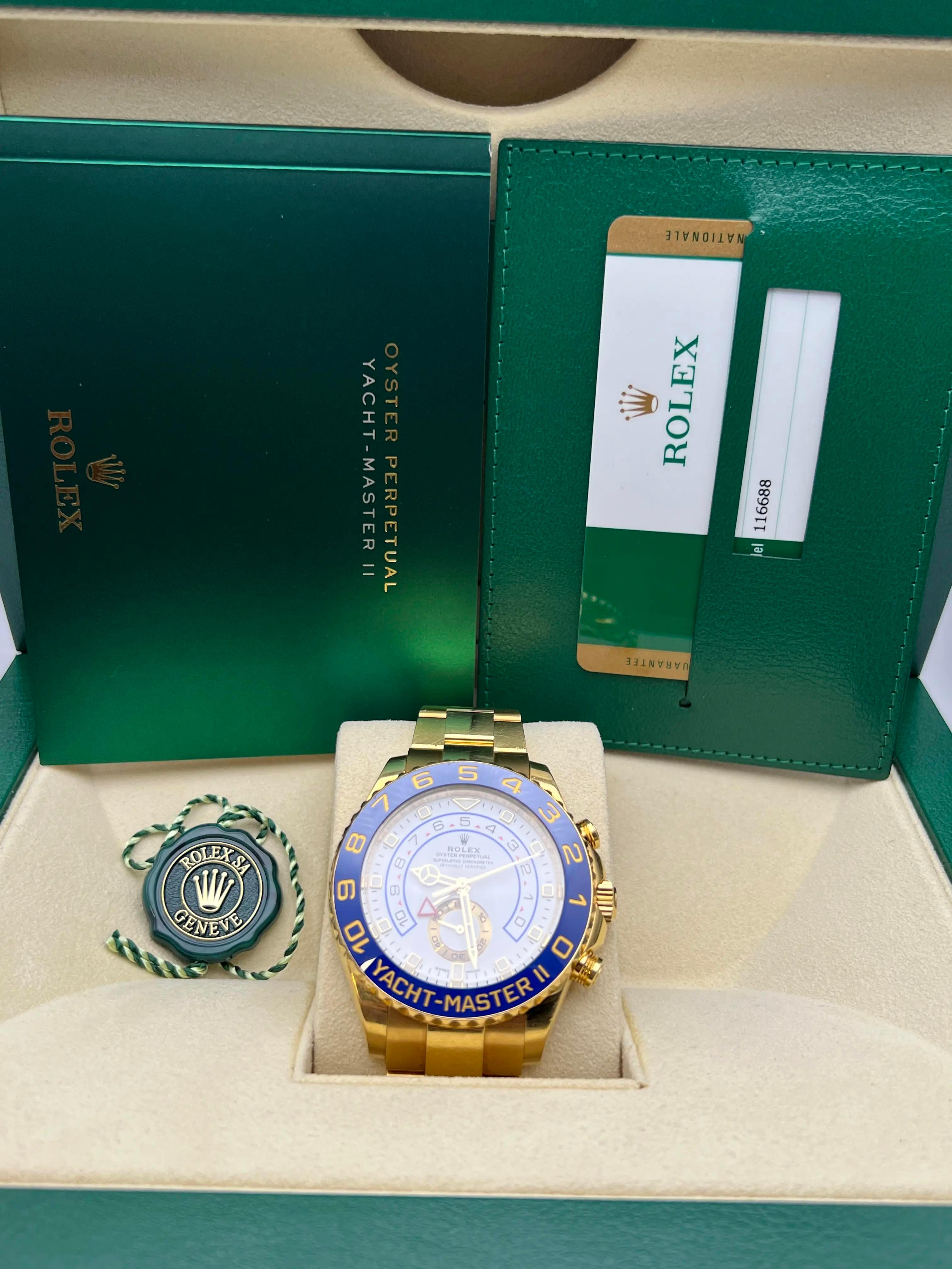 The Rolex Yacht-Master II (reference 116688) is a distinguished timepiece that exemplifies Rolex's commitment to blending classic design with advanced functionality. Crafted from solid 18K yellow gold, the 44mm Oyster case is complemented by a blue