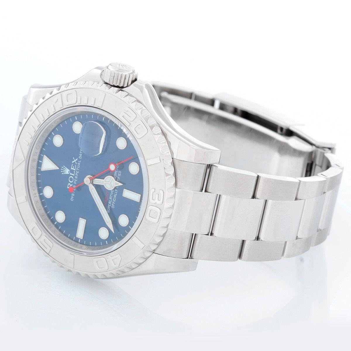 Rolex Yacht-Master Men's Stainless Steel Watch 116622 - Automatic winding, 31 jewels, Quickset, sapphire crystal. Stainless steel case with platinum bezel  (40mm diameter). Blue dial with luminous markers. Stainless steel Oyster bracelet with