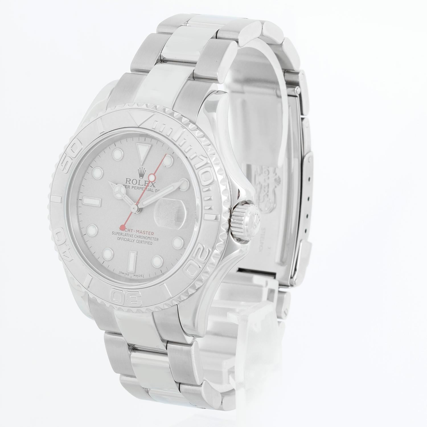 Rolex Yacht-Master Men's Stainless Steel Watch 16622 - Automatic winding, 31 jewels, Quickset, sapphire crystal. Stainless steel case with platinum bezel . Gray dial with luminous markers. Stainless steel Oyster bracelet with flip-lock clasp.