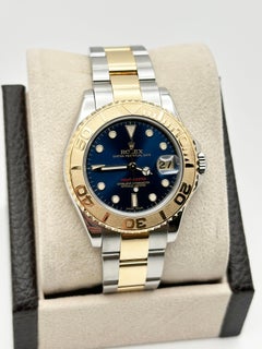 Rolex Yacht Master Midsize 168623 35mm Blue Dial 18K Gold Steel Box Papers