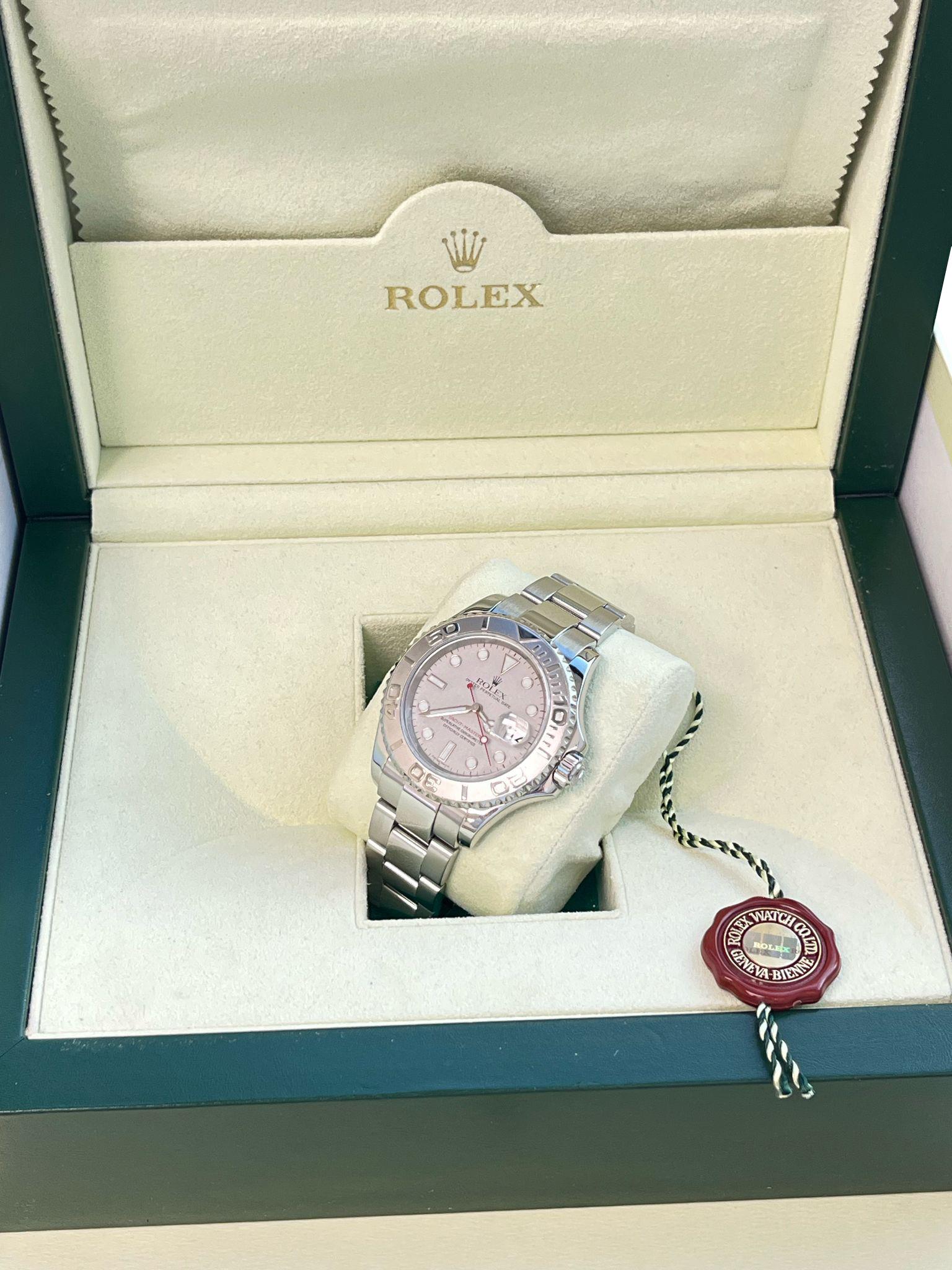 Rolex Yachtmaster Platinum Dial Bezel Steel Mens Watch 16622. Officially certified chronometer automatic self-winding movement. Stainless steel oyster case 40.0 mm in diameter. Rolex logo on the crown. Bi-directional rotating bezel.