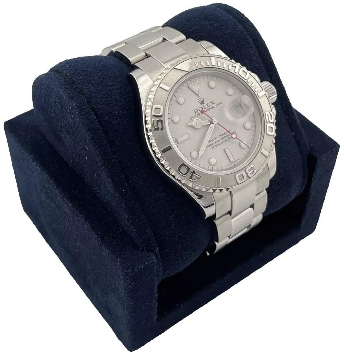 Refined, sporty, and unmistakably nautical—the Rolex Yacht-Master 16622 blends luxury with performance in a way only Rolex can. This 40mm men’s model features a solid stainless steel case paired with a striking platinum bezel, giving it a unique