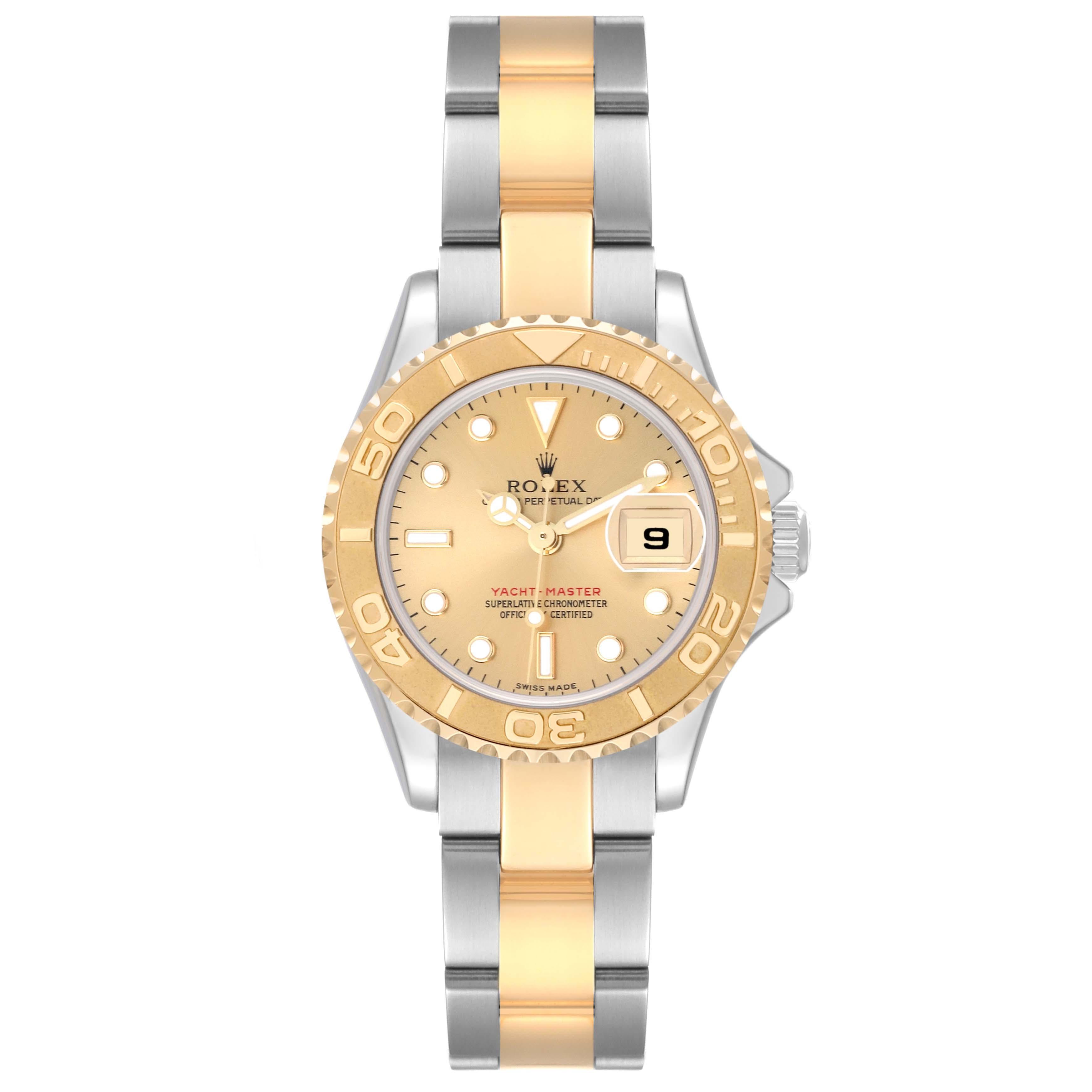 Rolex Yachtmaster 29 Steel Yellow Gold Champagne Dial Ladies Watch 169623. Officially certified chronometer automatic self-winding movement. Stainless steel and 18k yellow gold case 29 mm in diameter. Rolex logo on a crown. 18k yellow gold special