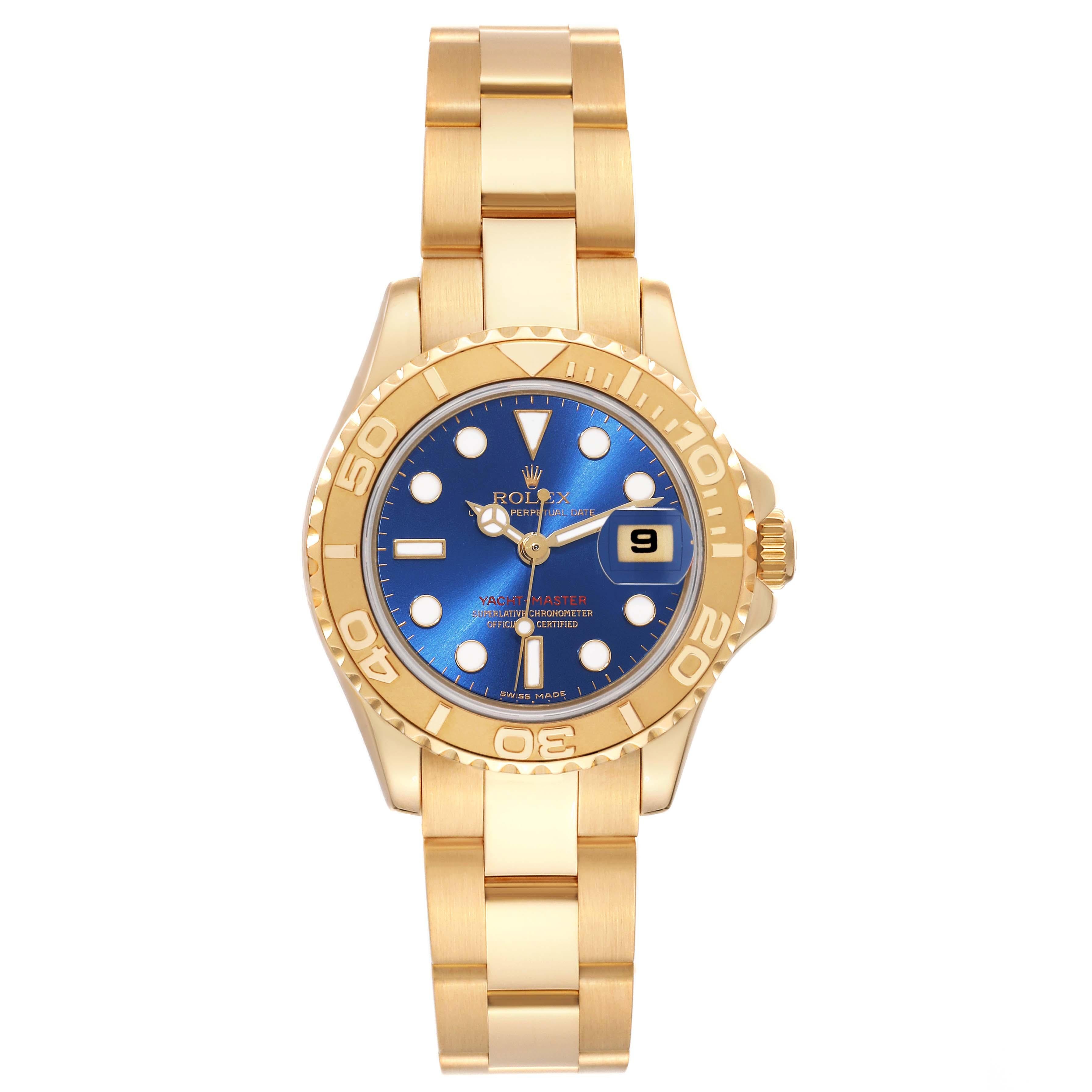 Rolex Yachtmaster 29 Yellow Gold Blue Dial Ladies Watch 69628 In Excellent Condition For Sale In Atlanta, GA