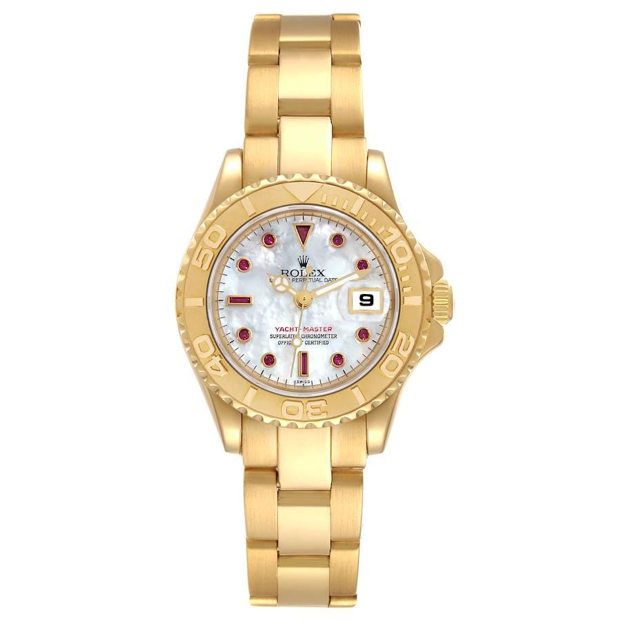 Rolex Yachtmaster 29 Yellow Gold MOP Ruby Dial Ladies Watch 169628. Officially certified chronometer self-winding movement. 18K yellow gold case 29 mm in diameter. Rolex logo on a crown. 18K yellow gold special time-lapse unidirectional rotating