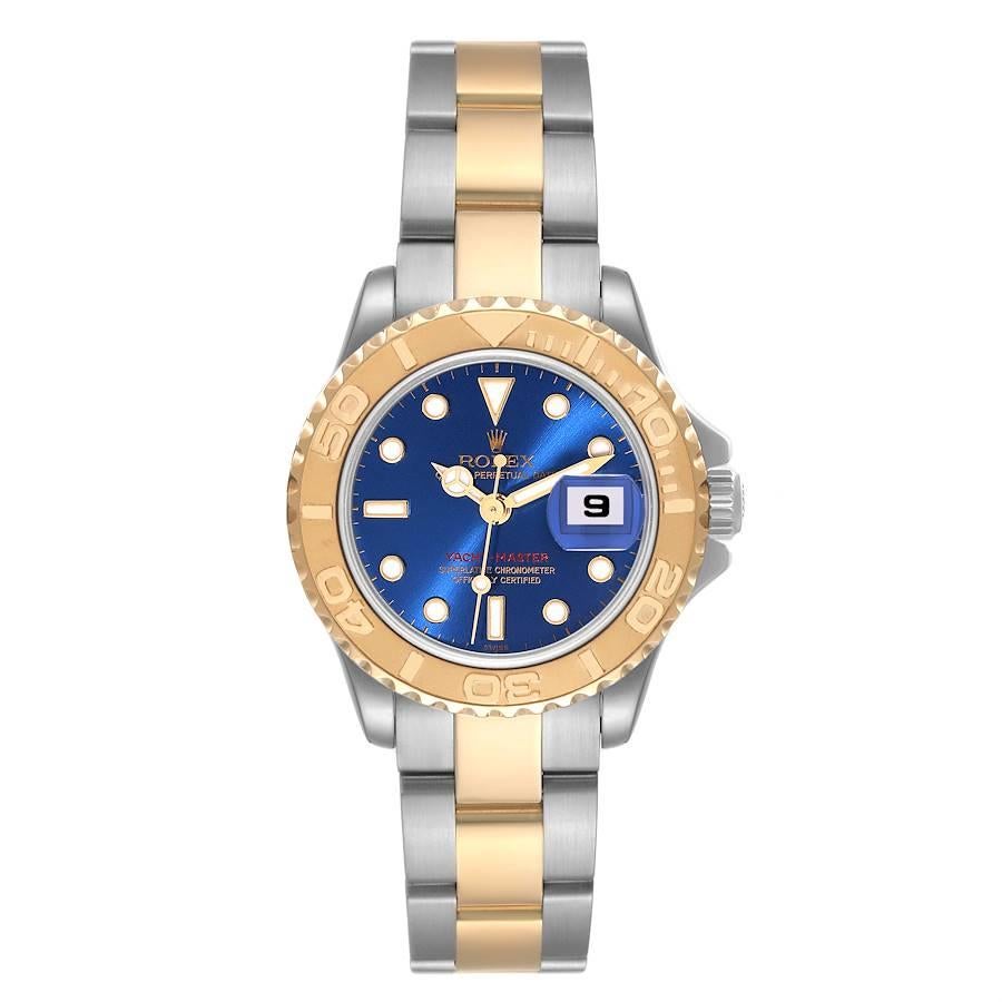 Rolex Yachtmaster 29mm Steel Yellow Gold Blue Dial Ladies Watch 169623 Papers. Officially certified chronometer automatic self-winding movement. Stainless steel and 18K yellow gold case 29 mm in diameter. Rolex logo on the crown. 18K yellow gold