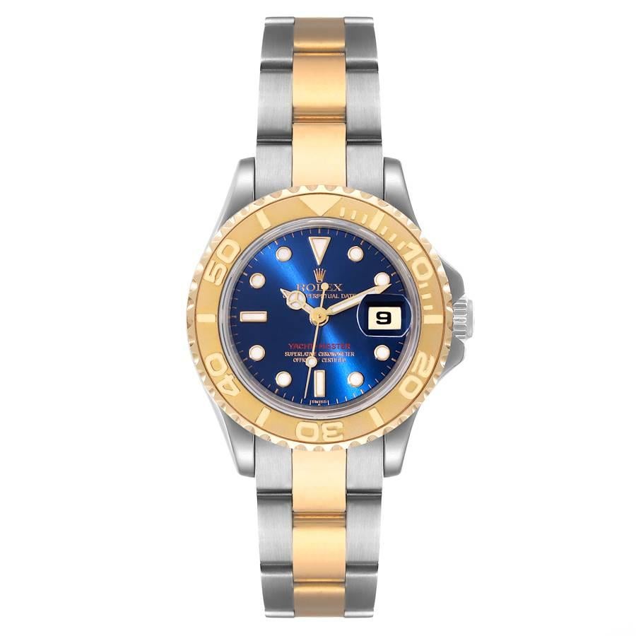 Rolex Yachtmaster 29mm Steel Yellow Gold Blue Dial Ladies Watch 69623. Officially certified chronometer automatic self-winding movement. Stainless steel and 18K yellow gold case 29 mm in diameter. Rolex logo on the crown. 18K yellow gold special