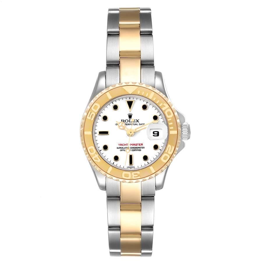 Rolex Yachtmaster 29mm White Dial Steel Yellow Gold Ladies Watch 69623. Officially certified chronometer automatic self-winding movement. Stainless steel and 18K yellow gold case 29 mm in diameter. Rolex logo on the crown. 18K yellow gold special