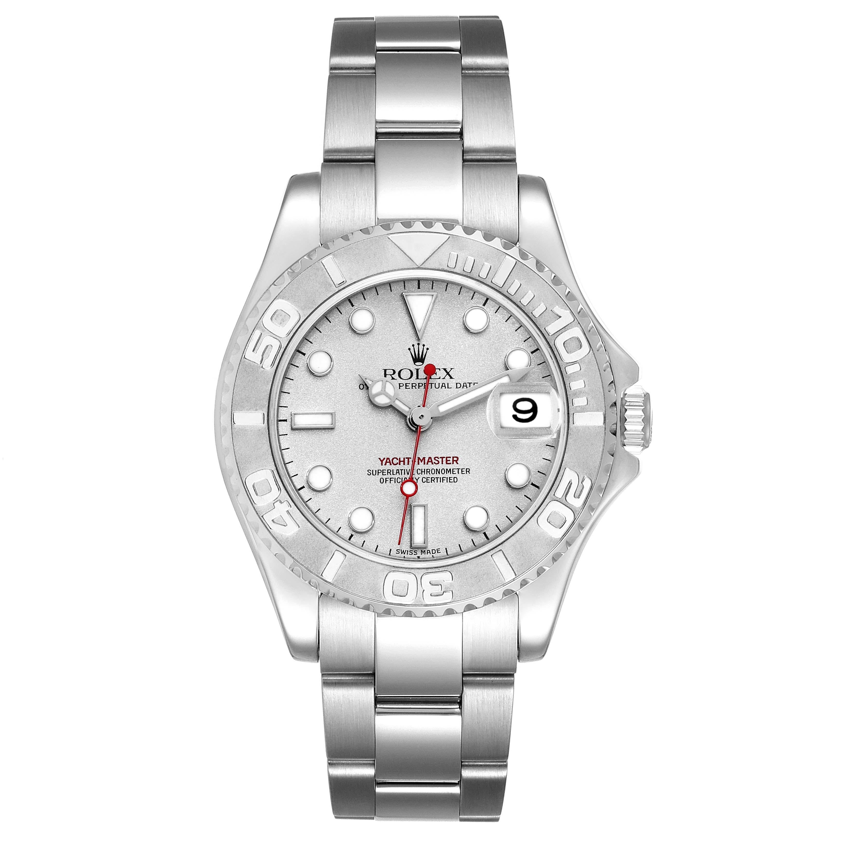 Rolex Yachtmaster 35 Midsize Steel Platinum Mens Watch 168622 Box Papers. Officially certified chronometer automatic self-winding movement. Stainless steel case 35.0 mm in diameter. Rolex logo on the crown. Platinum special time-lapse bidirectional