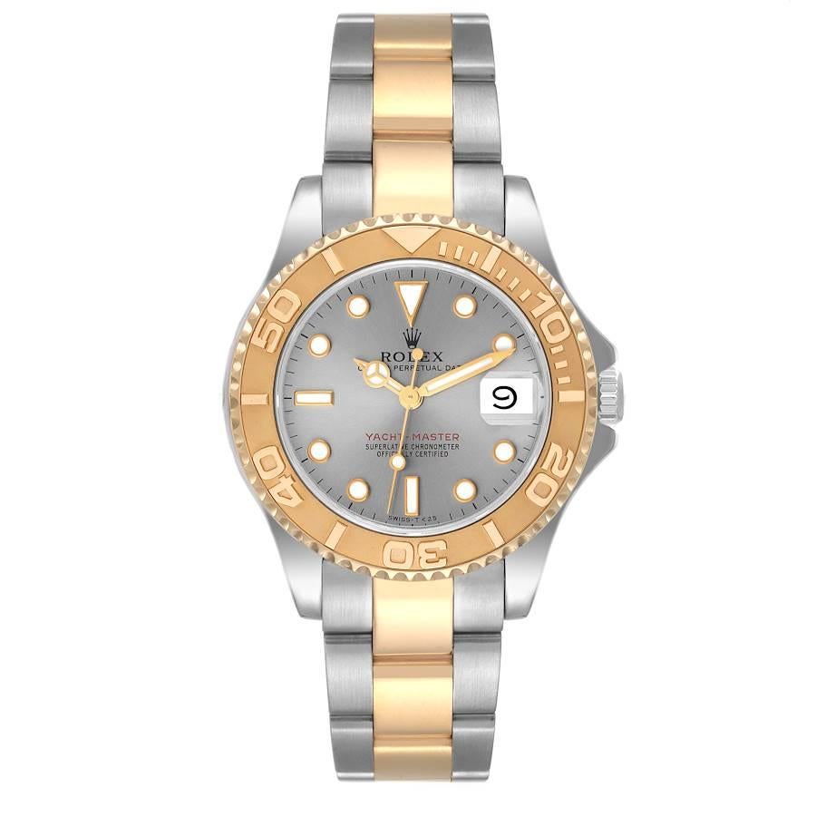 Rolex Yachtmaster 35 Midsize Steel Yellow Gold Slate Dial Mens Watch 68623. Officially certified chronometer automatic self-winding movement. Stainless steel and 18K yellow gold case 35.0 mm in diameter. Rolex logo on the crown. 18K yellow gold