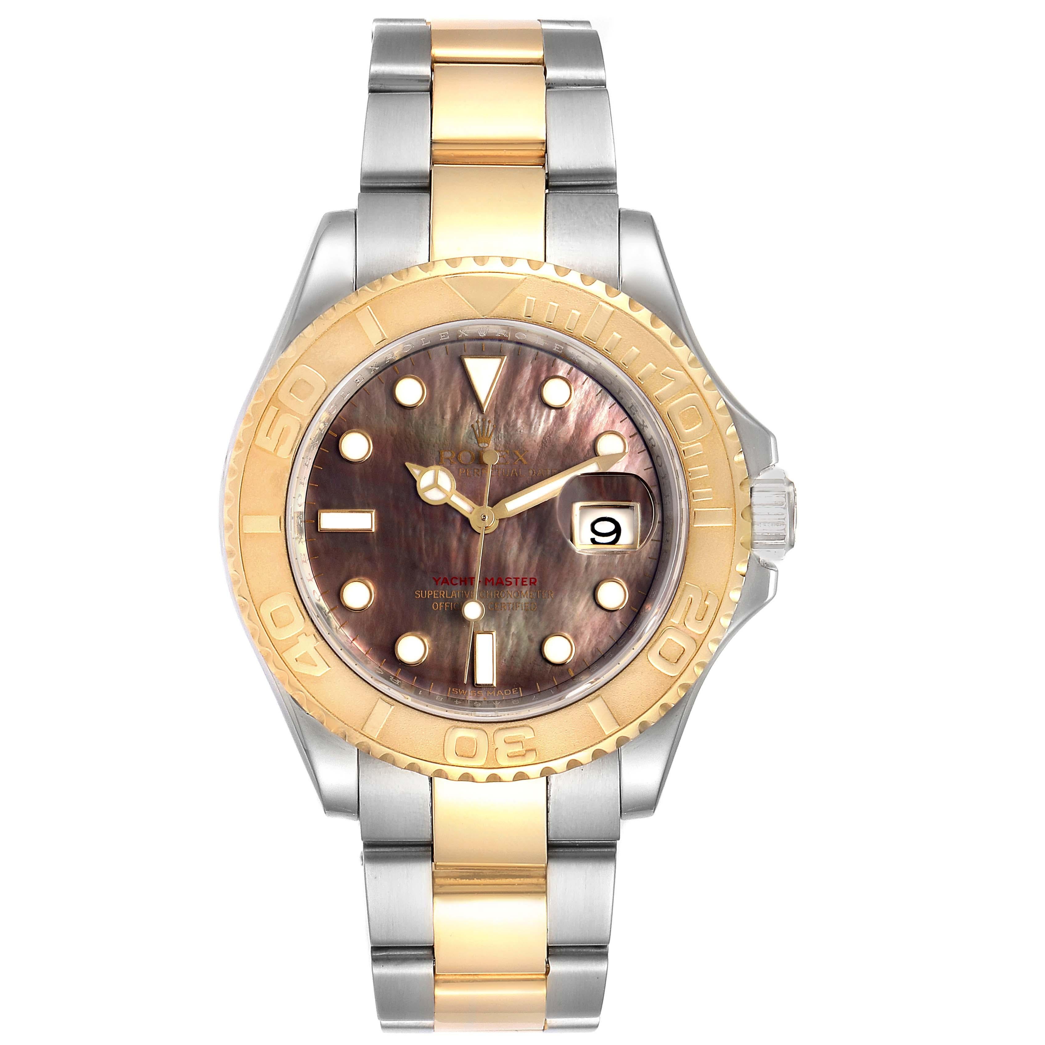 Rolex Yachtmaster 40 Steel Yellow Gold MOP Mens Watch 16623 Box Card. Officially certified chronometer self-winding movement. Stainless steel case 40 mm in diameter. Rolex logo on a crown. 18k yellow gold special time-lapse unidirectional rotating