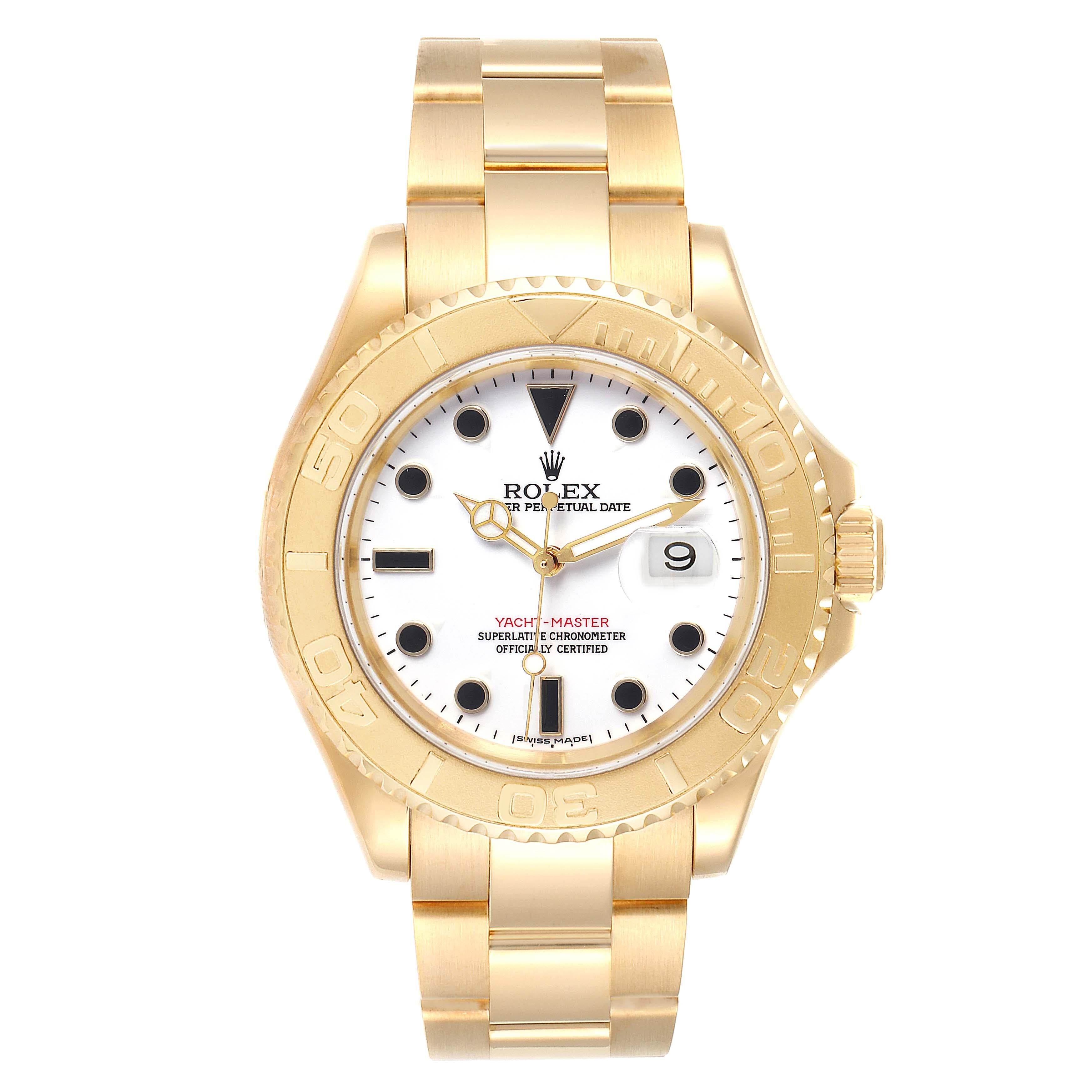 Rolex Yachtmaster 40 Yellow Gold White Dial Mens Watch 16628 Box Papers. Officially certified chronometer self-winding movement. Rhodium-plated, oeil-de-perdrix decoration, straight-line lever escapement, freesprung monometallic balance adjusted to