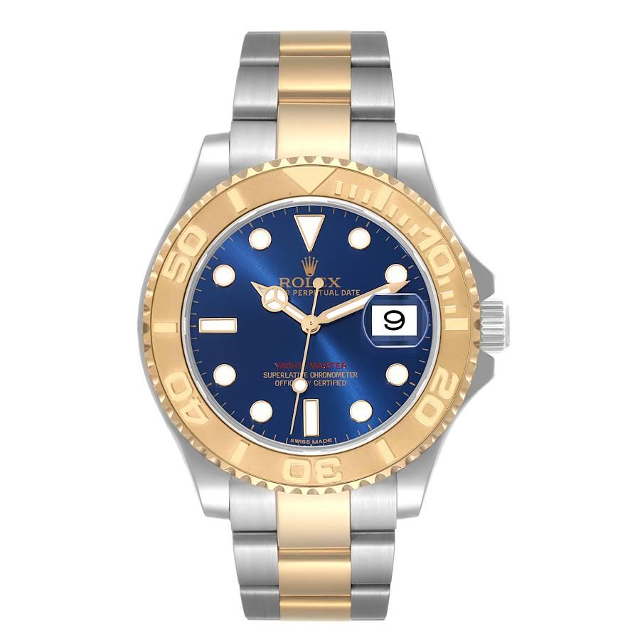 Rolex Yachtmaster 40mm Steel Yellow Gold Blue Dial Mens Watch 16623 Box Card. Officially certified chronometer self-winding movement. Stainless steel case 40 mm in diameter. Rolex logo on a crown. 18k yellow gold special time-lapse unidirectional
