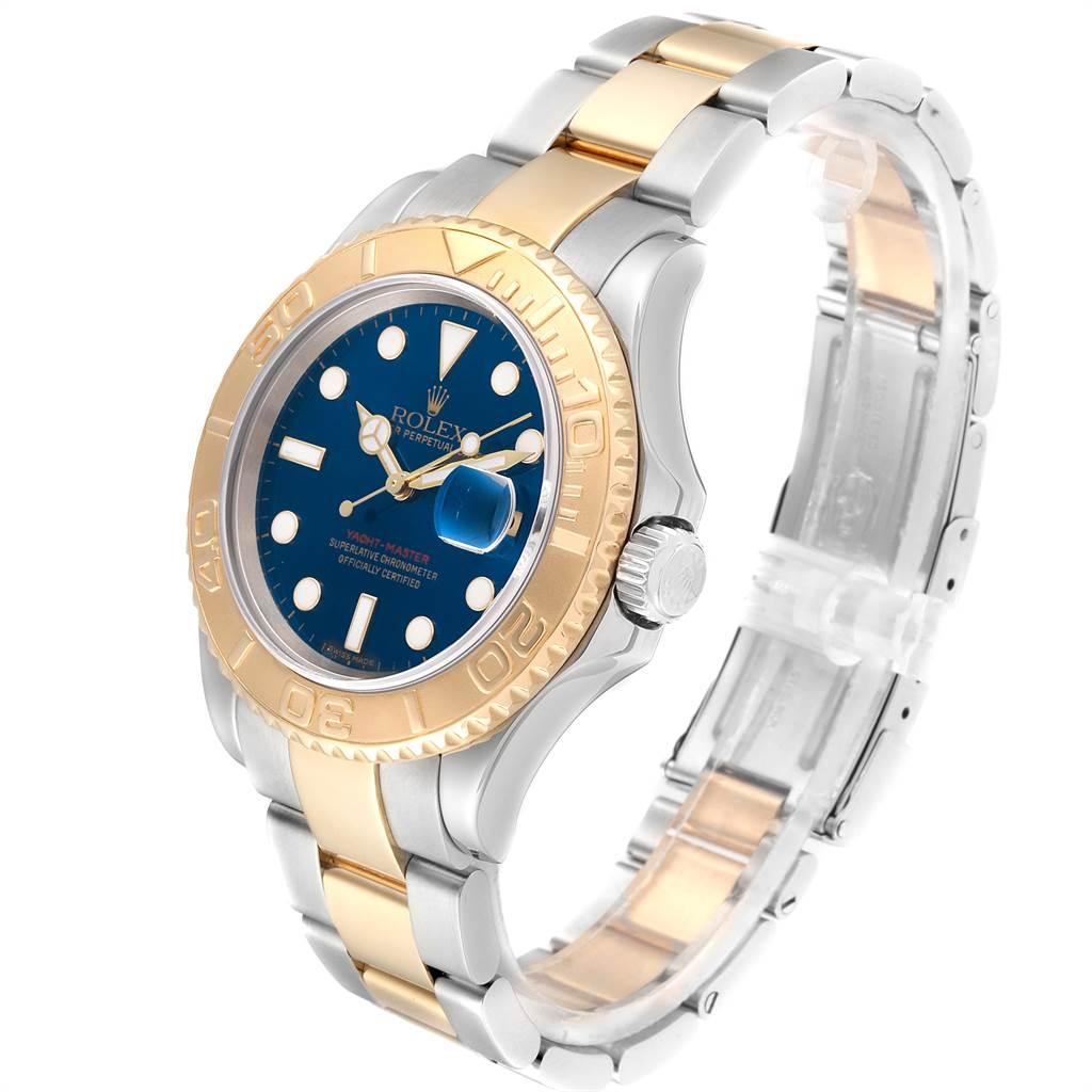 Rolex Yachtmaster 40mm Steel Yellow Gold Blue Dial Mens Watch 16623. Officially certified chronometer self-winding movement. Stainless steel case 40 mm in diameter. Rolex logo on a crown. 18k yellow gold special time-lapse unidirectional rotating