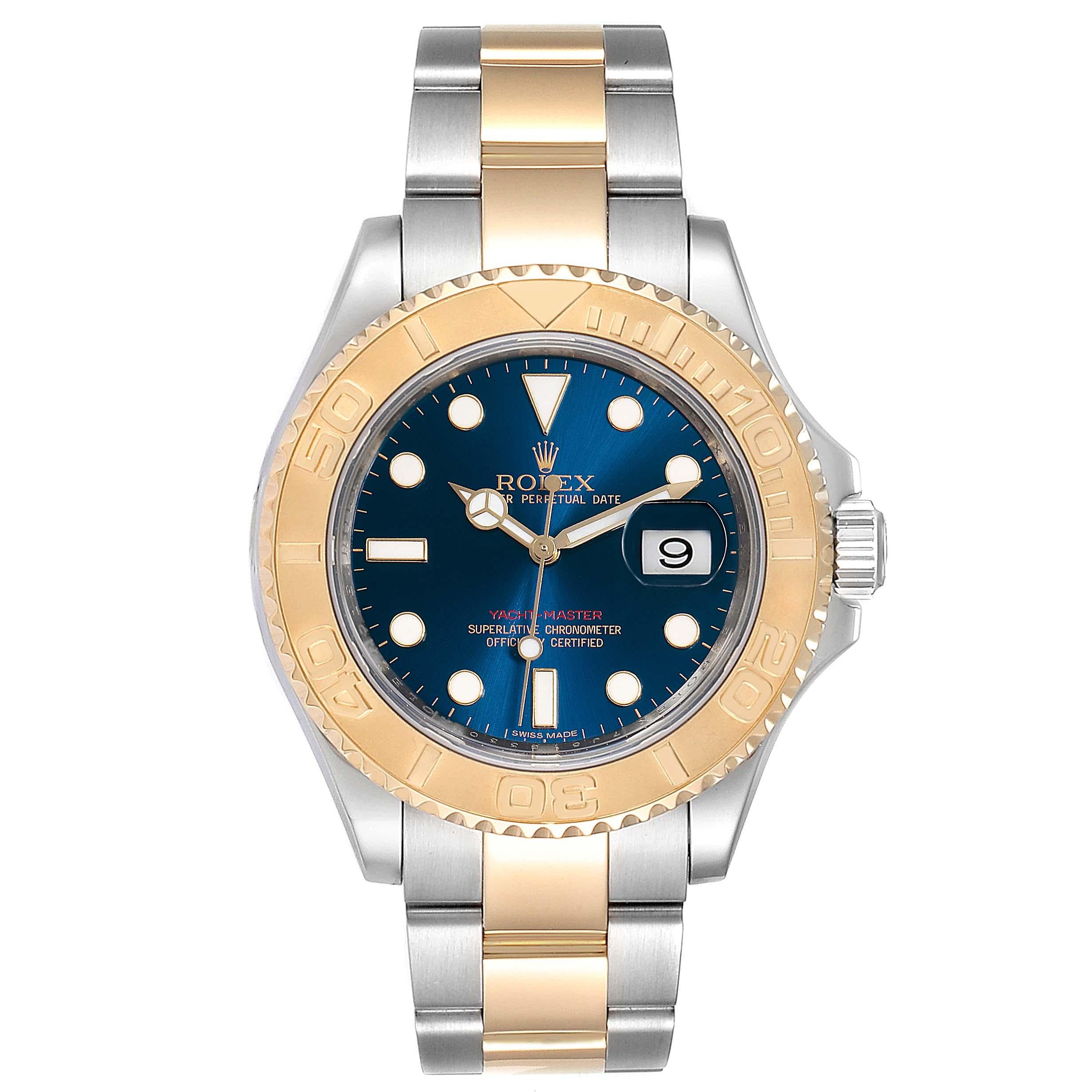 Rolex Yachtmaster 40mm Steel Yellow Gold Blue Dial Mens Watch 16623. Officially certified chronometer self-winding movement. Stainless steel case 40 mm in diameter. Rolex logo on a crown. 18k yellow gold special time-lapse unidirectional rotating