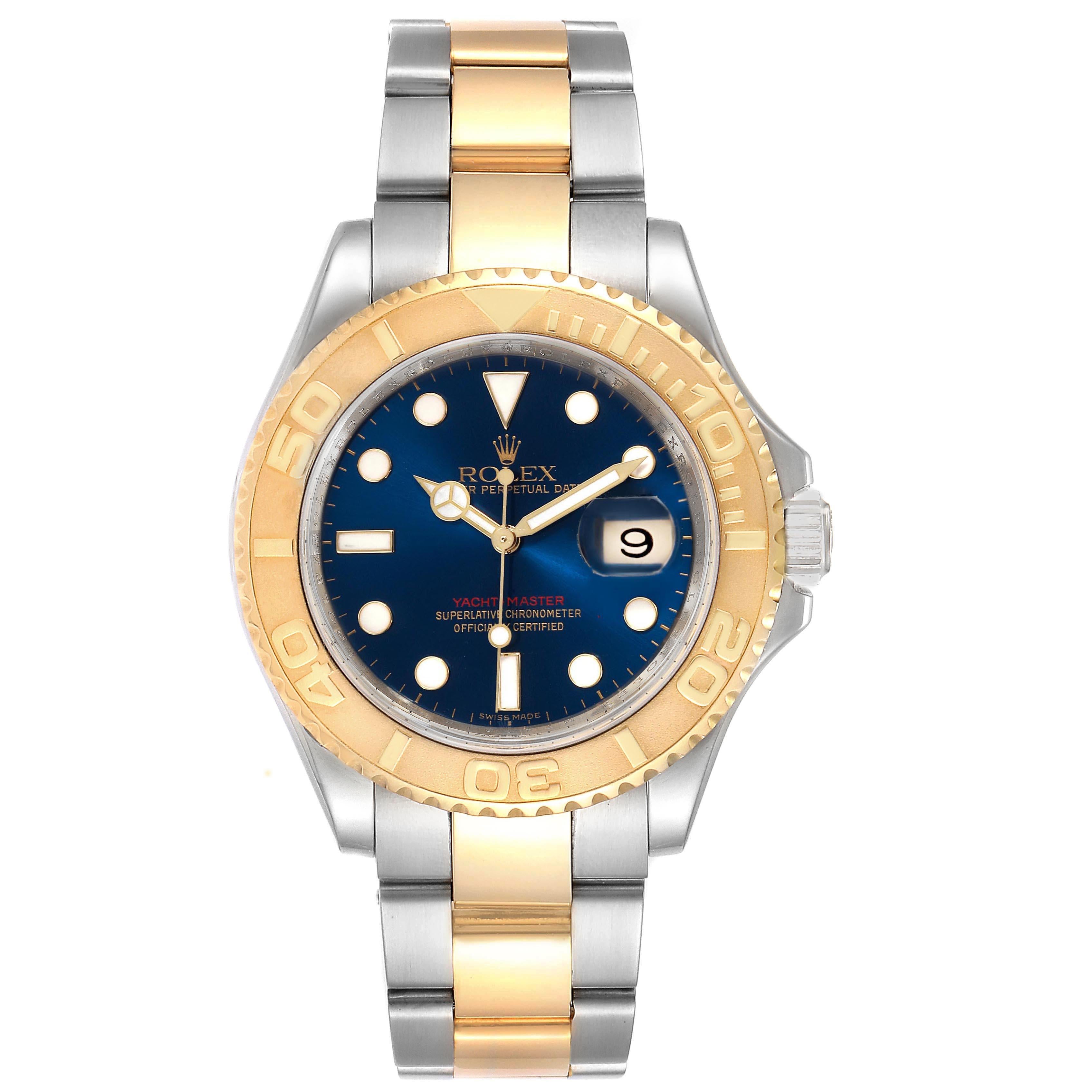 Rolex Yachtmaster 40mm Steel Yellow Gold Blue Dial Mens Watch 16623. Officially certified chronometer self-winding movement. Stainless steel case 40.0 mm in diameter. Rolex logo on a crown. 18k yellow gold special time-lapse unidirectional rotating