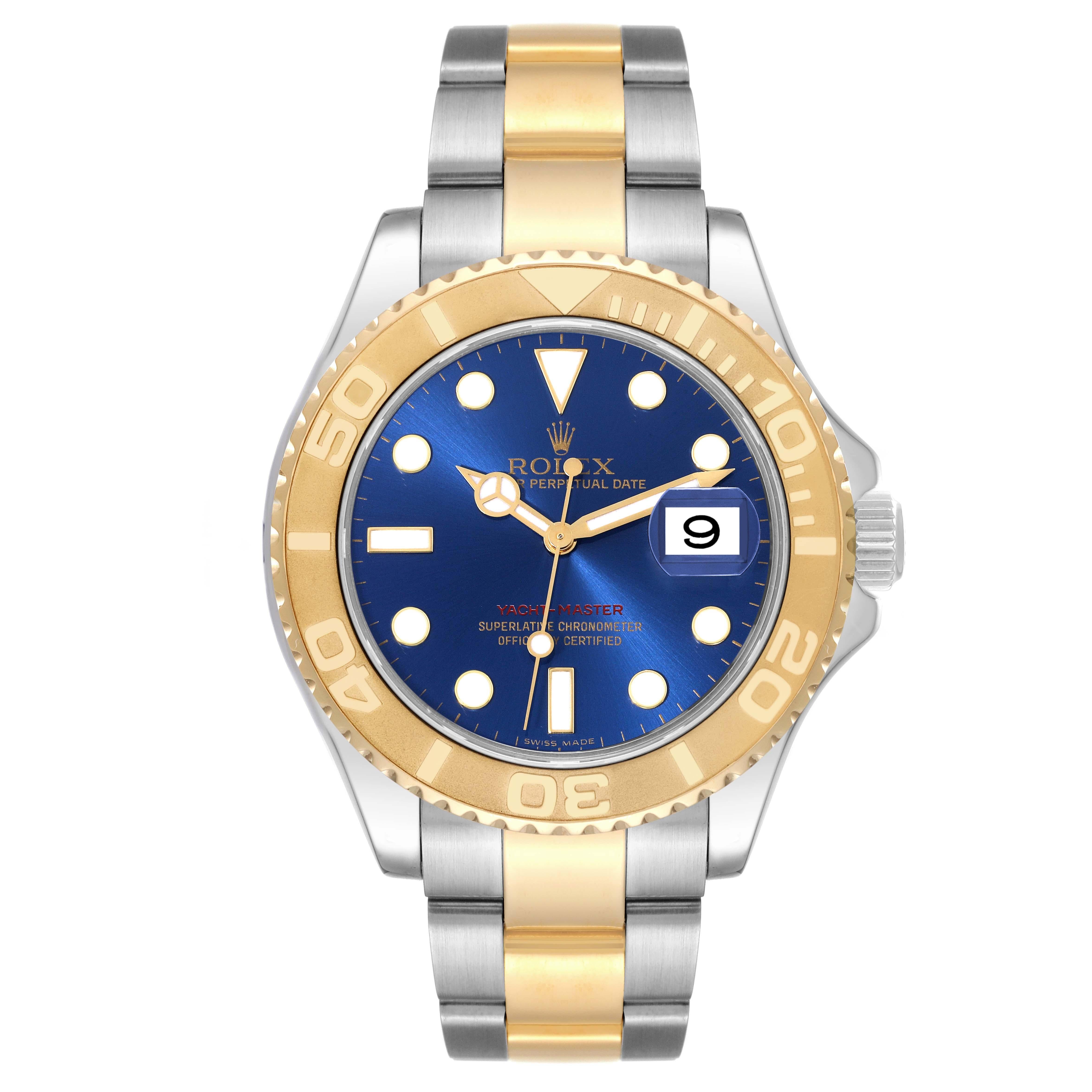 Rolex Yachtmaster 40mm Steel Yellow Gold Blue Dial Mens Watch 16623. Officially certified chronometer self-winding movement. Stainless steel case 40 mm in diameter. Rolex logo on a crown. 18k yellow gold special time-lapse unidirectional rotating