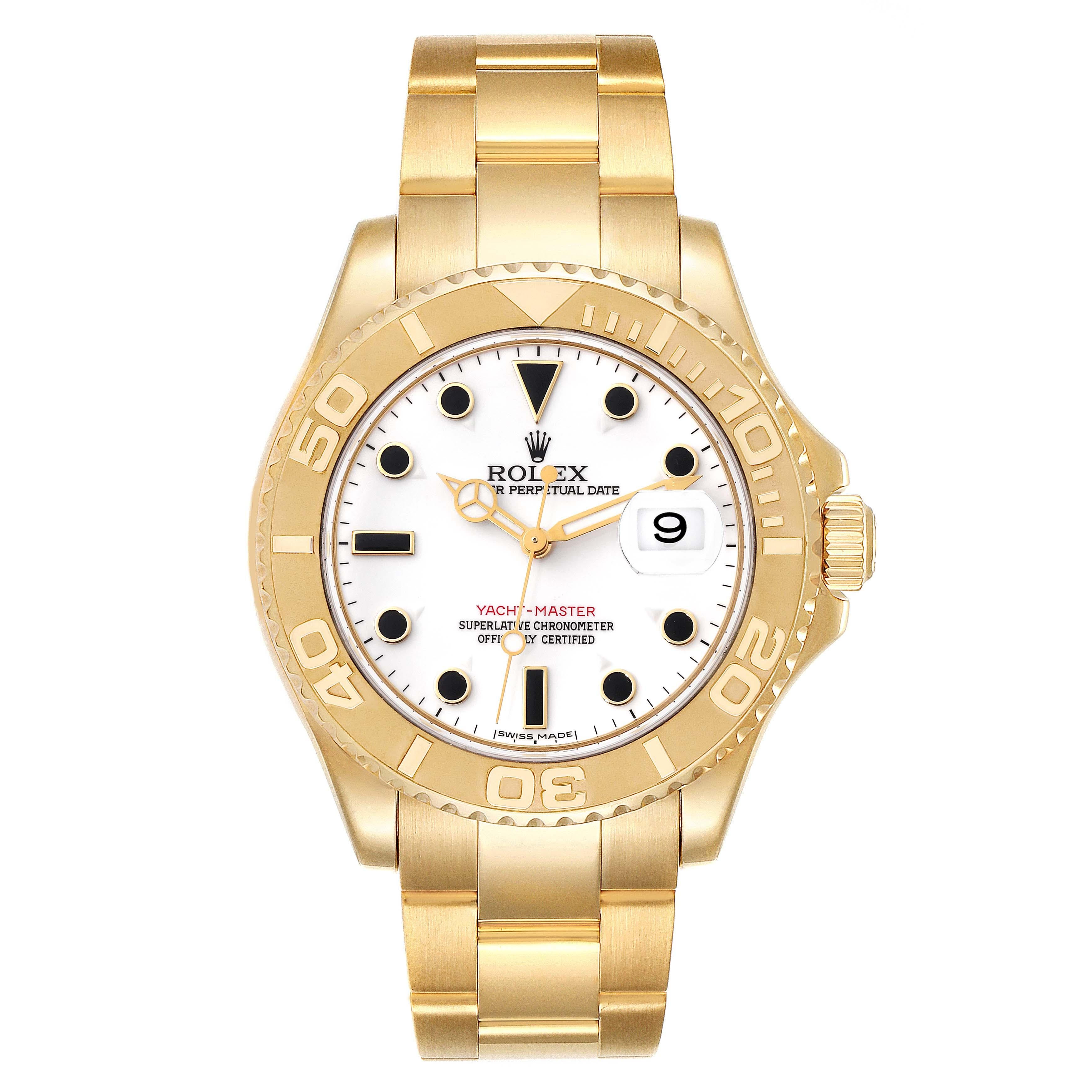 Rolex Yachtmaster 40mm Yellow Gold White Dial Mens Watch 16628 Box Papers. Officially certified chronometer automatic self-winding movement. Rhodium-plated, oeil-de-perdrix decoration, straight-line lever escapement, freesprung monometallic balance