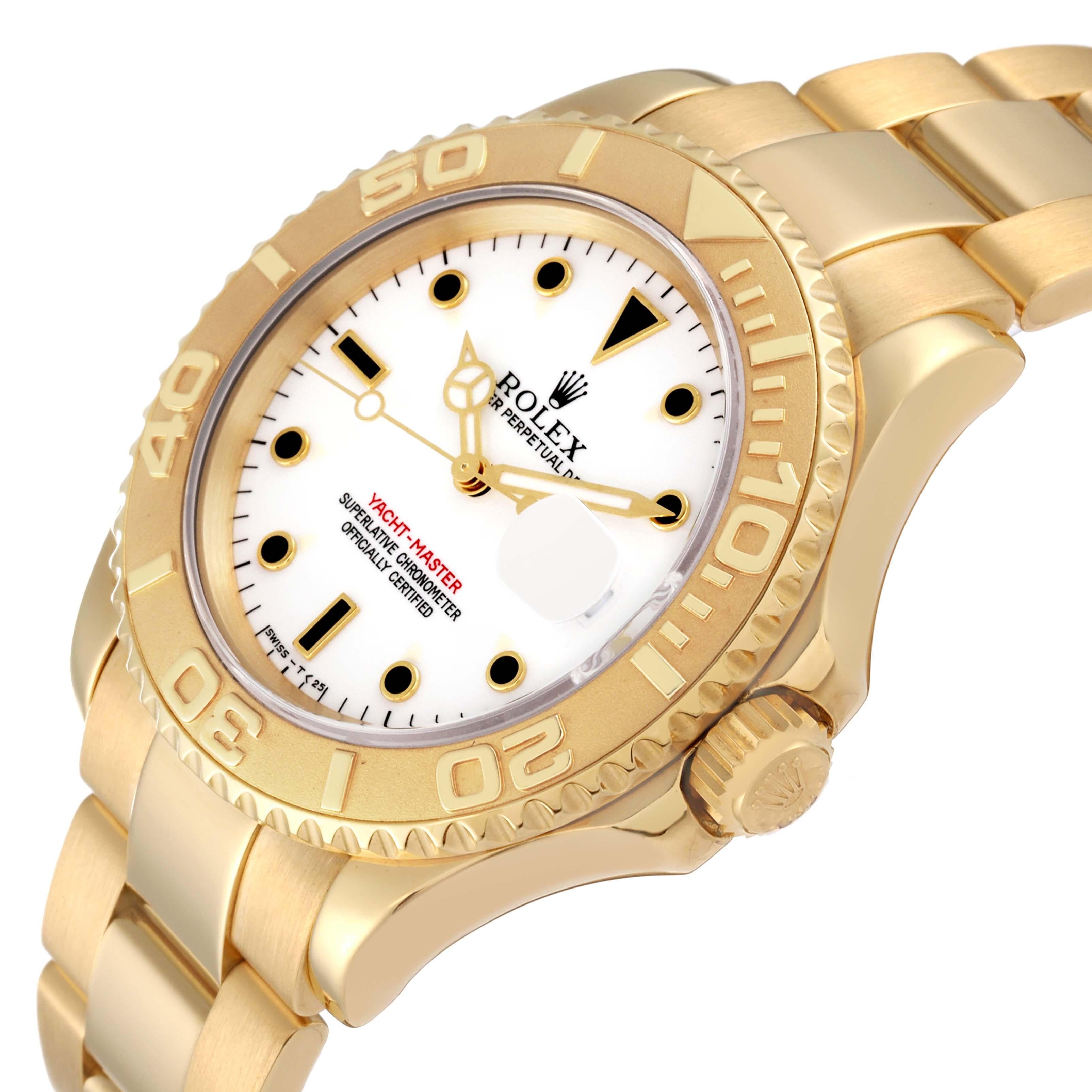 Rolex Yachtmaster 40mm Yellow Gold White Dial Mens Watch 16628. Officially certified chronometer automatic self-winding movement. Rhodium-plated, oeil-de-perdrix decoration, straight-line lever escapement, freesprung monometallic balance adjusted to