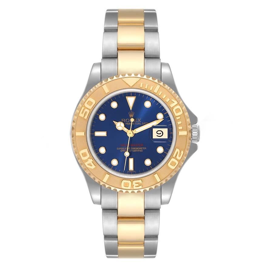Rolex Yachtmaster Midsize 35mm Steel Yellow Gold Mens Watch 168623. Officially certified chronometer automatic self-winding movement. Stainless steel and 18K yellow gold case 35.0 mm in diameter. Rolex logo on the crown. 18K yellow gold special