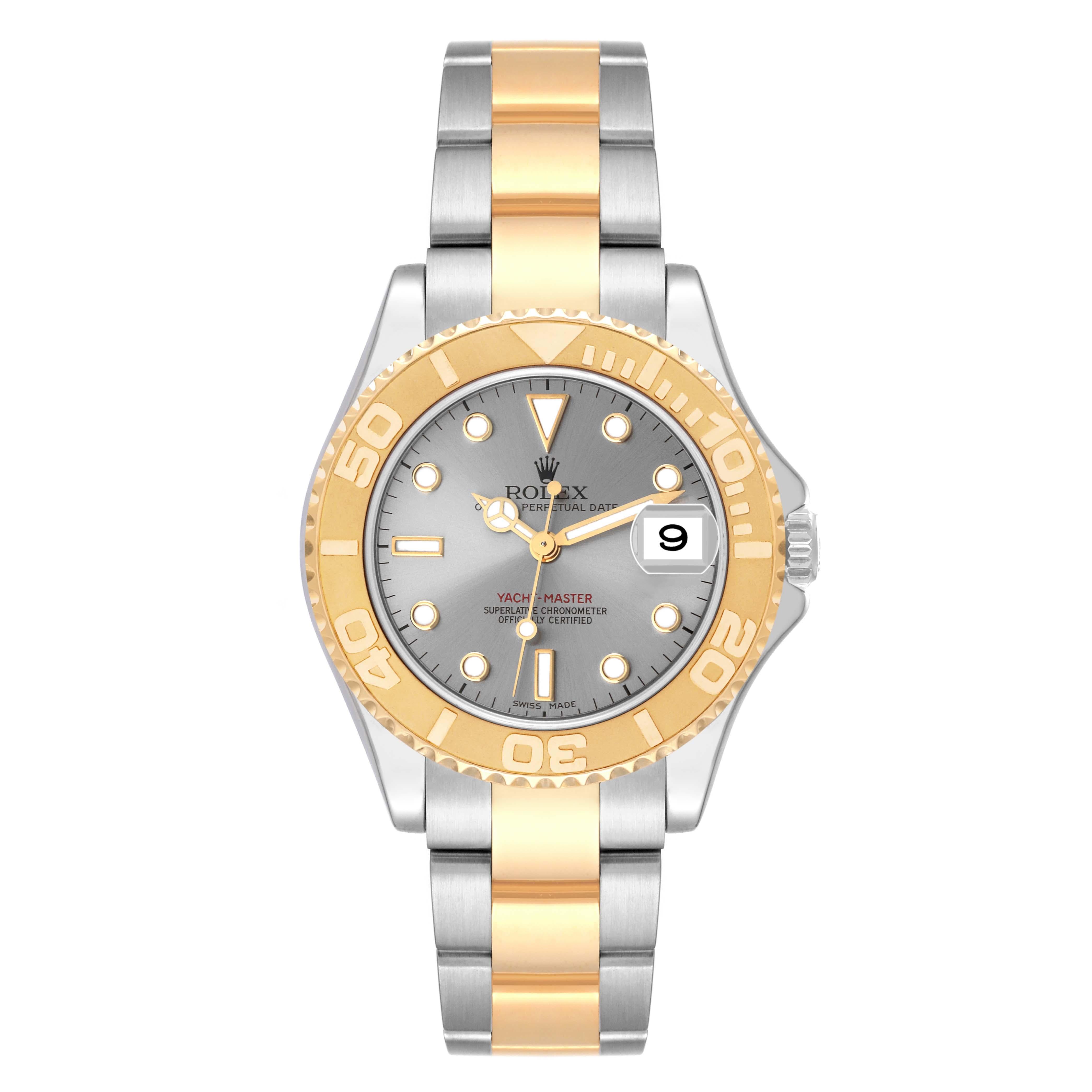 Rolex Yachtmaster Midsize Steel Yellow Gold Mens Watch 168623 Box Papers. Officially certified chronometer automatic self-winding movement. Stainless steel and 18K yellow gold case 35.0 mm in diameter. Rolex logo on the crown. 18K yellow gold