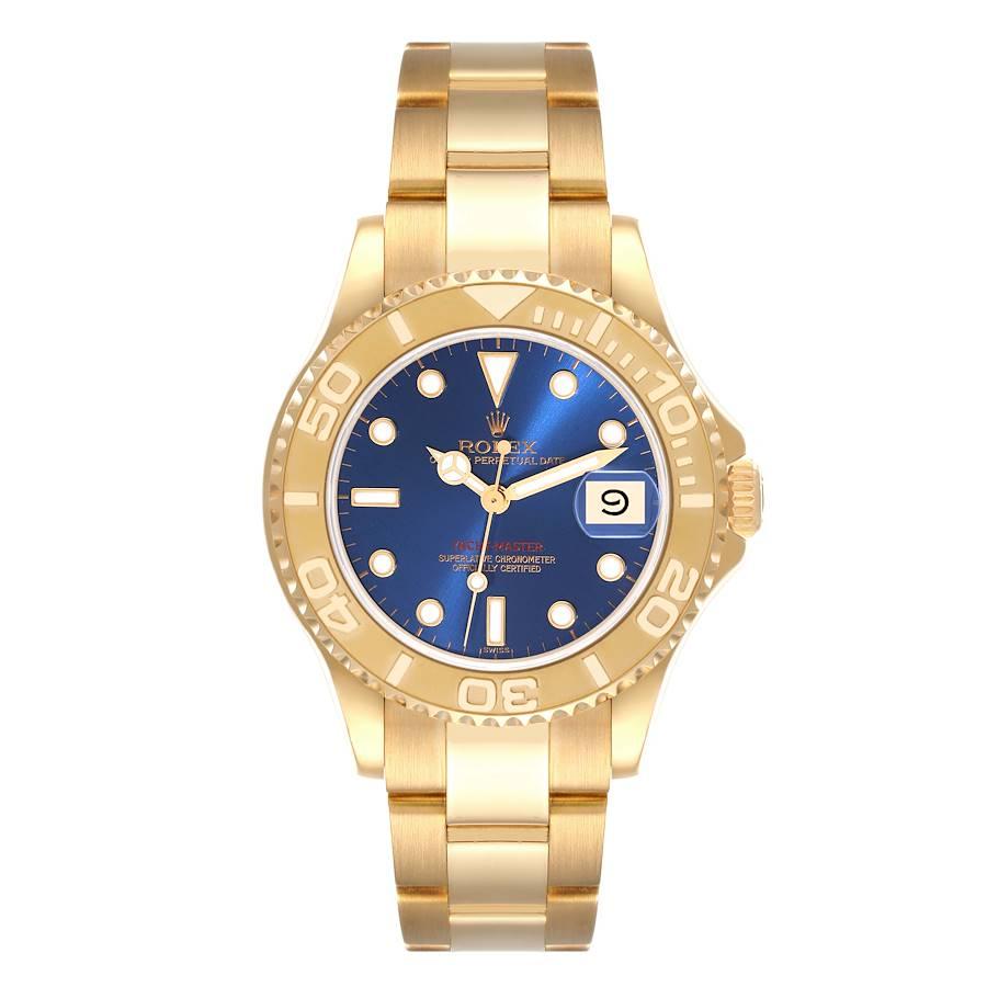 Rolex Yachtmaster Midsize Yellow Gold Blue Dial Unisex Watch 68628 Box Papers. Officially certified chronometer self-winding movement. 18K yellow gold case 35.0 mm in diameter. Rolex logo on a crown. 18k yellow gold special time-lapse unidirectional