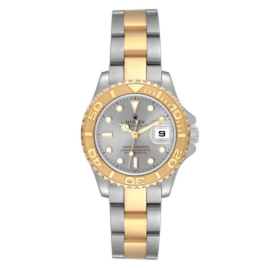 Rolex Yachtmaster Steel Yellow Gold Ladies Watch 69623 Box Papers. Officially certified chronometer self-winding movement. Stainless steel and 18K yellow gold case 29 mm in diameter. Rolex logo on a crown. 18K yellow gold special time-lapse