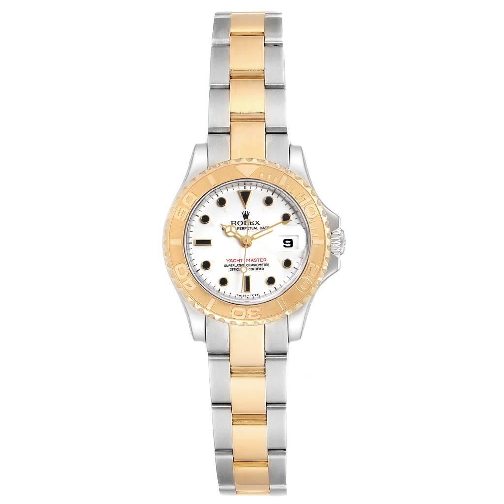 Rolex Yachtmaster Steel Yellow Gold White Dial Ladies Watch 69623. Officially certified chronometer self-winding movement. Stainless steel and 18K yellow gold case 29 mm in diameter. Rolex logo on a crown. 18K yellow gold special time-lapse